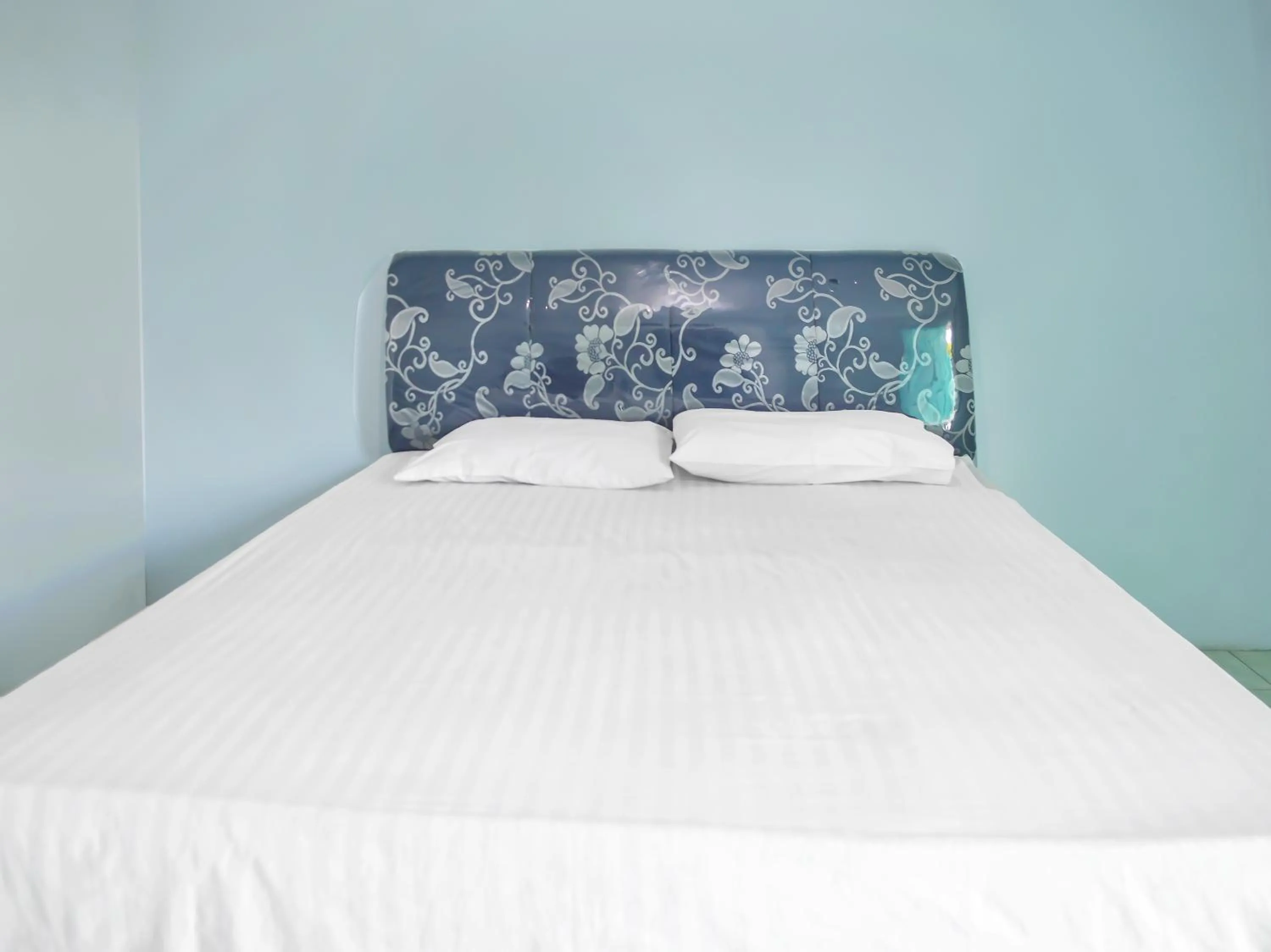 Bedroom in OYO 1745 Guest House Nur Aziziah Syariah 2