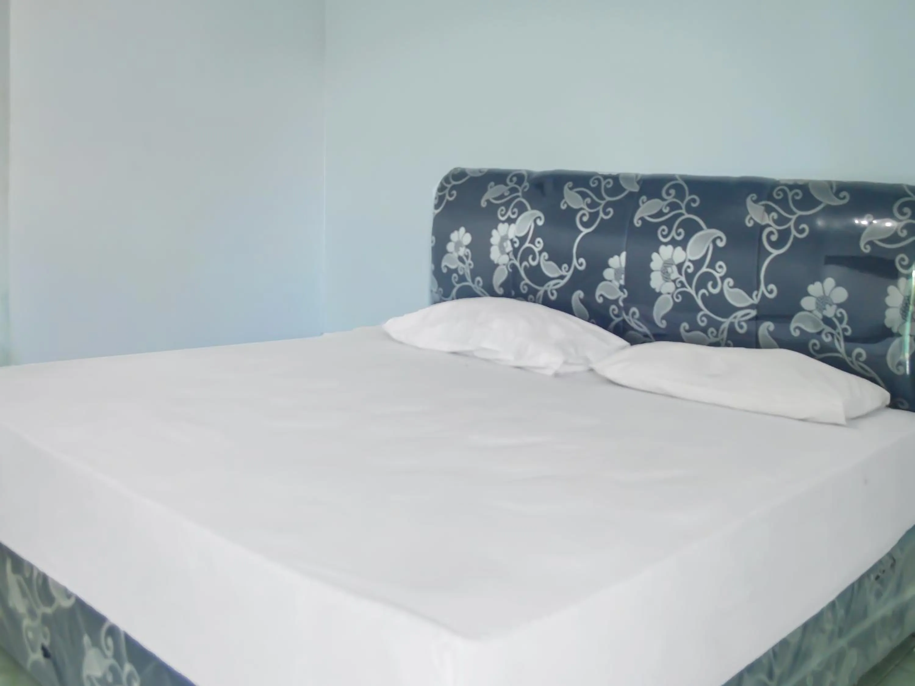 Bedroom in OYO 1745 Guest House Nur Aziziah Syariah 2