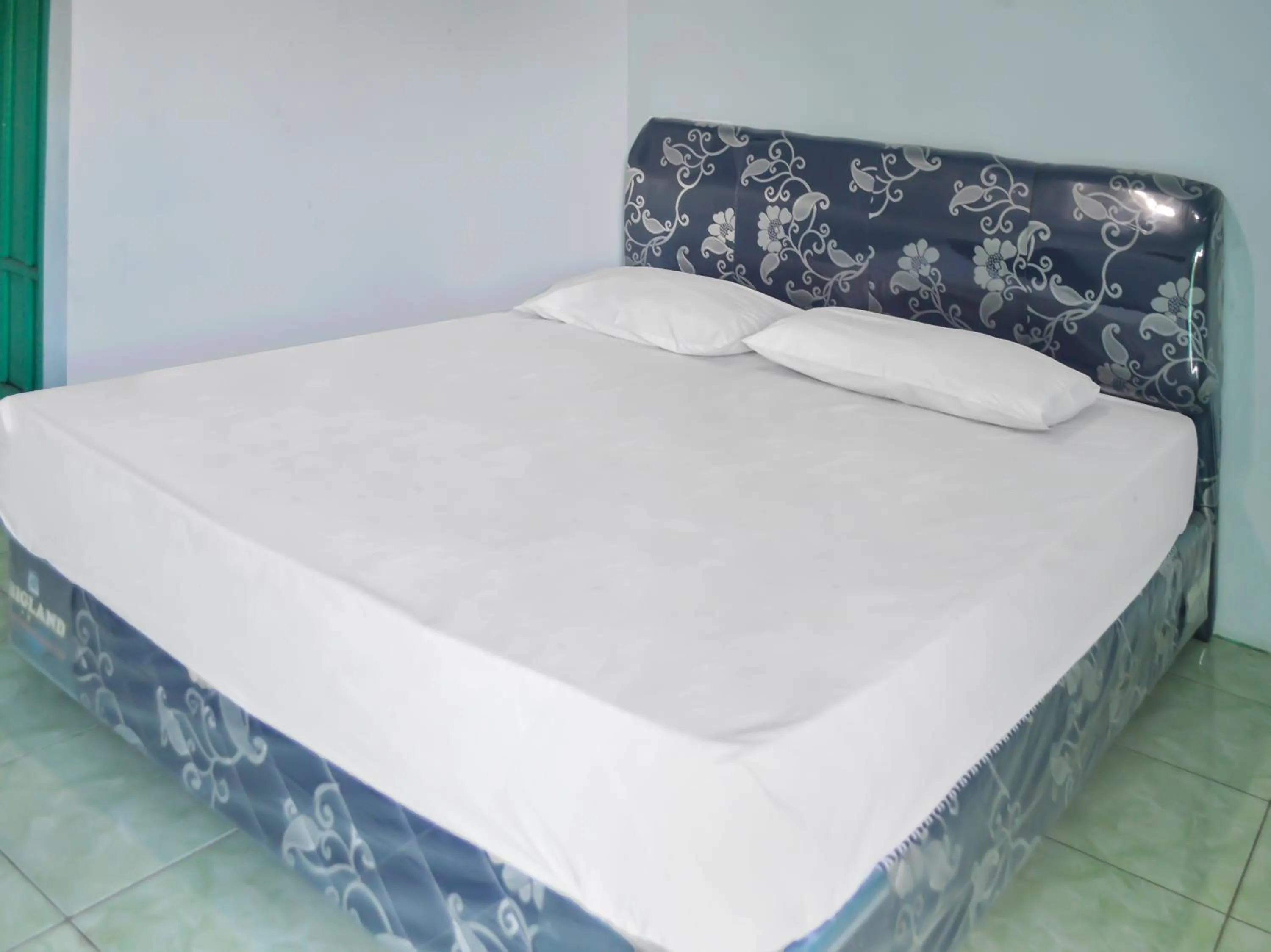 Bedroom in OYO 1745 Guest House Nur Aziziah Syariah 2