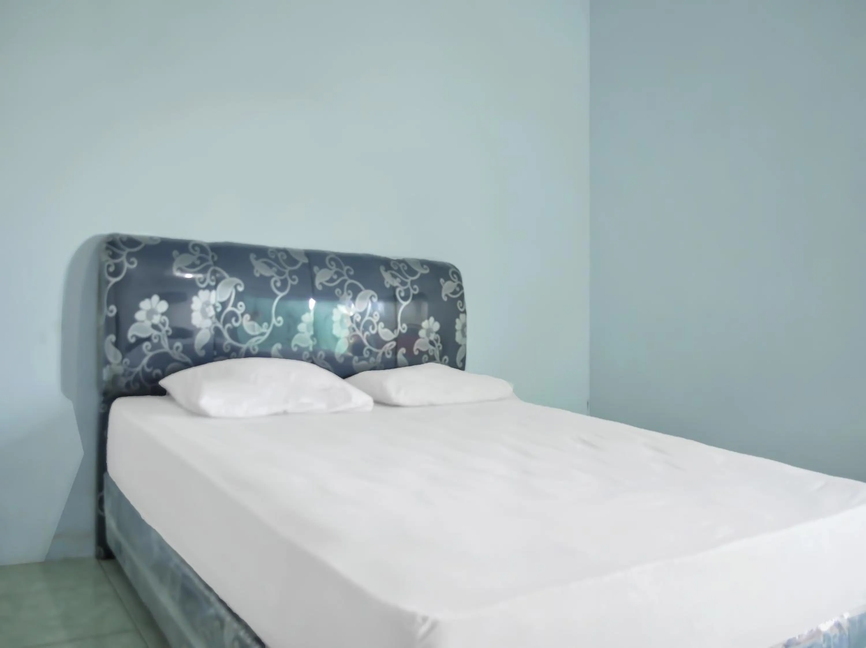 Bedroom in OYO 1745 Guest House Nur Aziziah Syariah 2