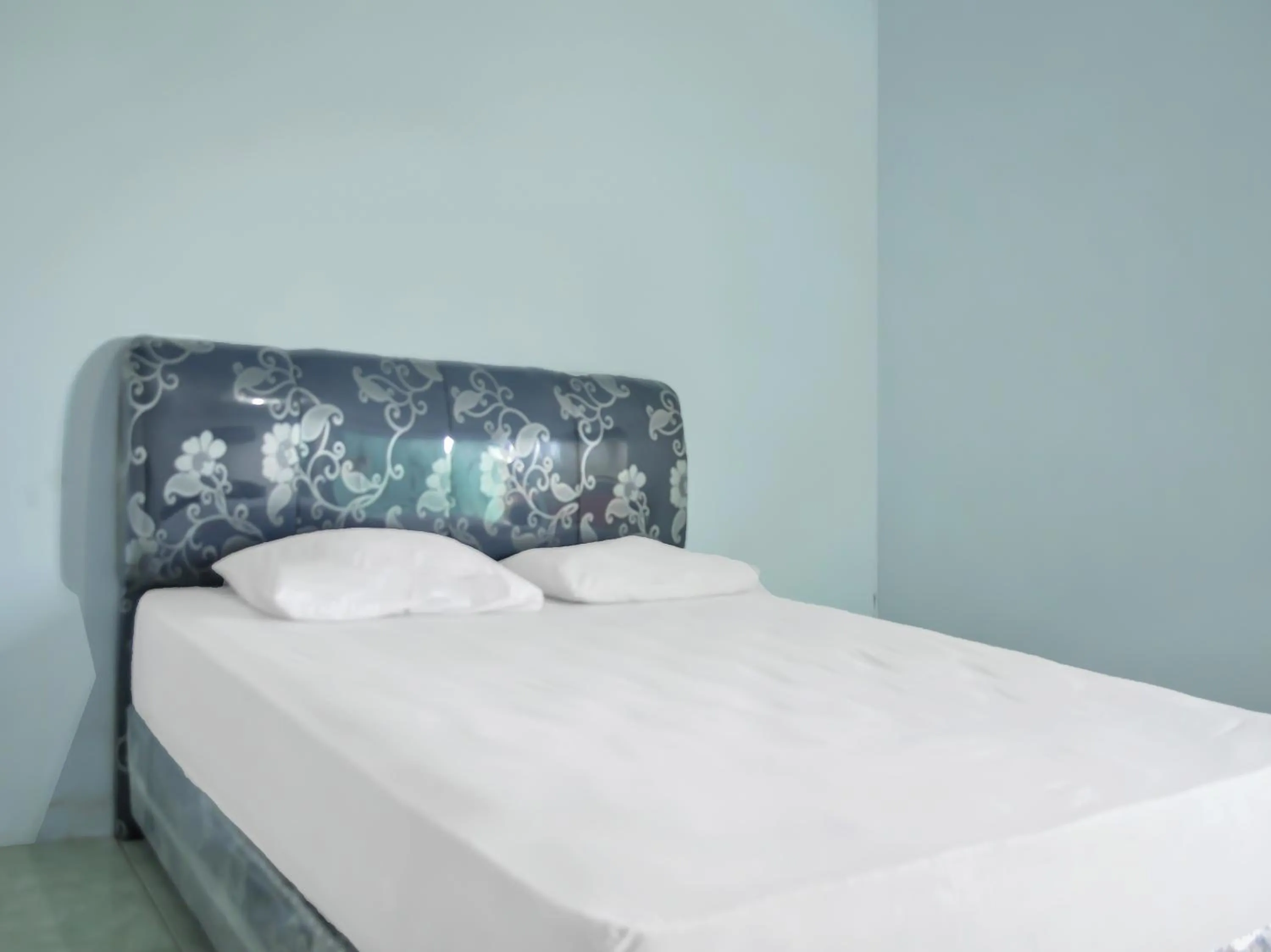 Bedroom in OYO 1745 Guest House Nur Aziziah Syariah 2