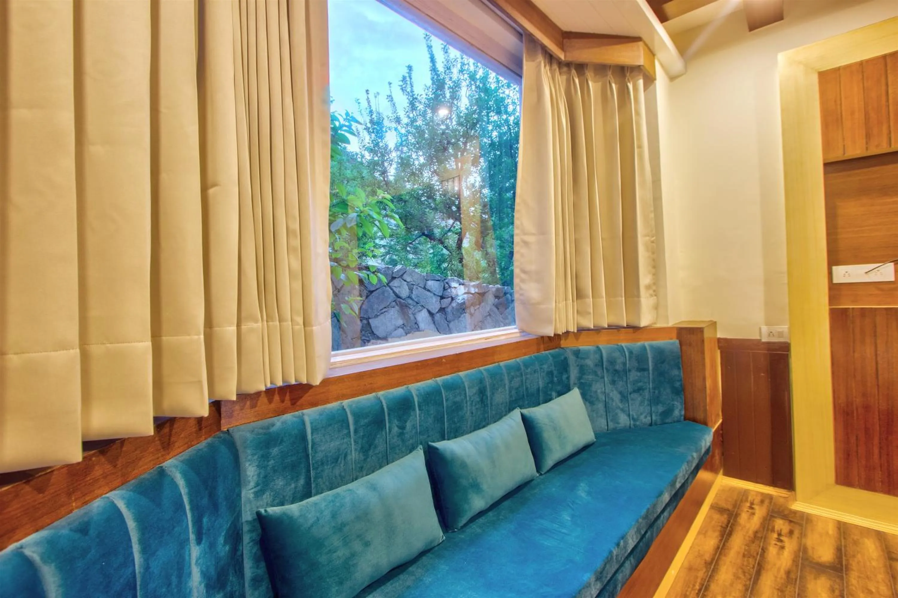 Seating area in Baan by Snow City Farm