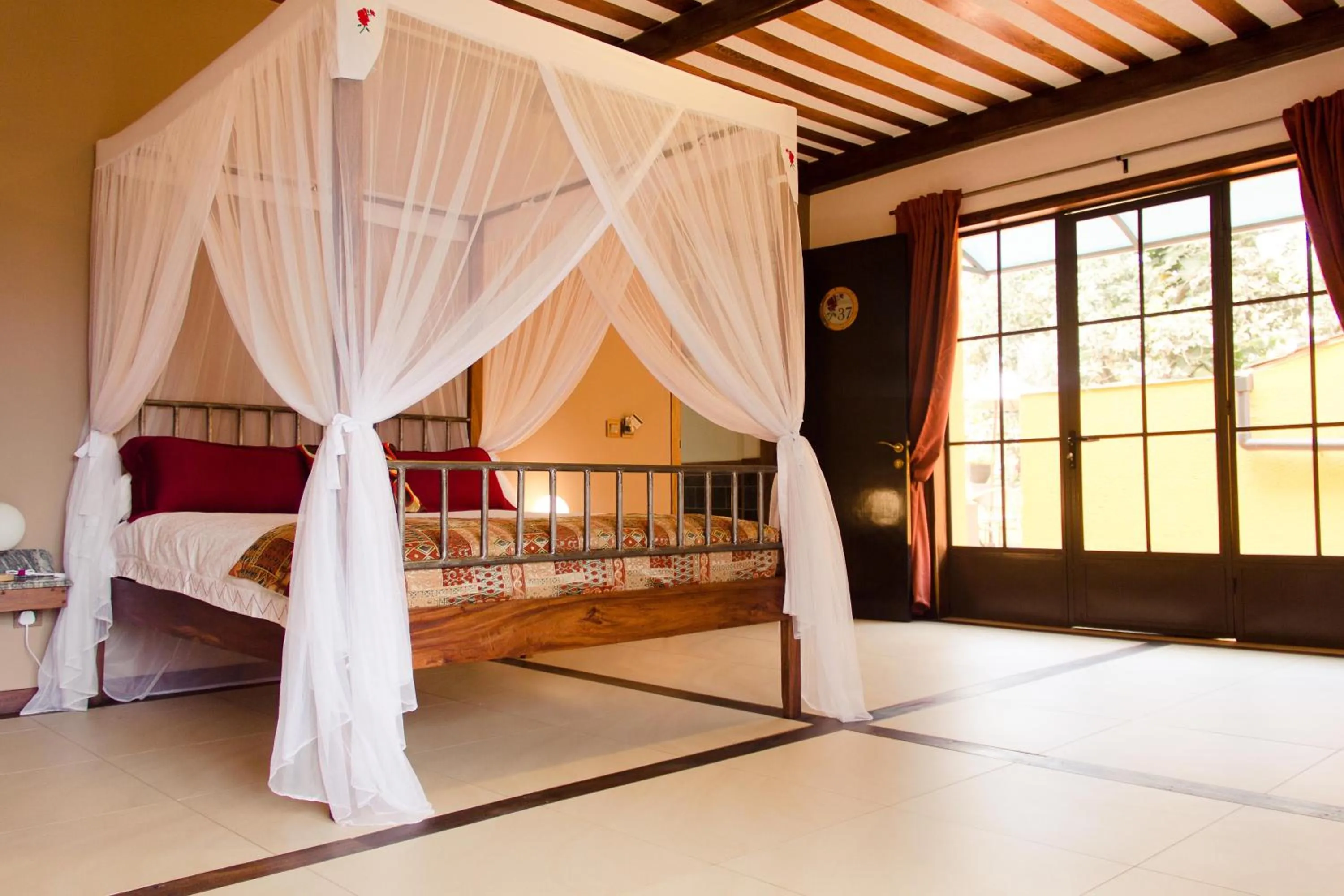 Bed in Hotel Bougainviller