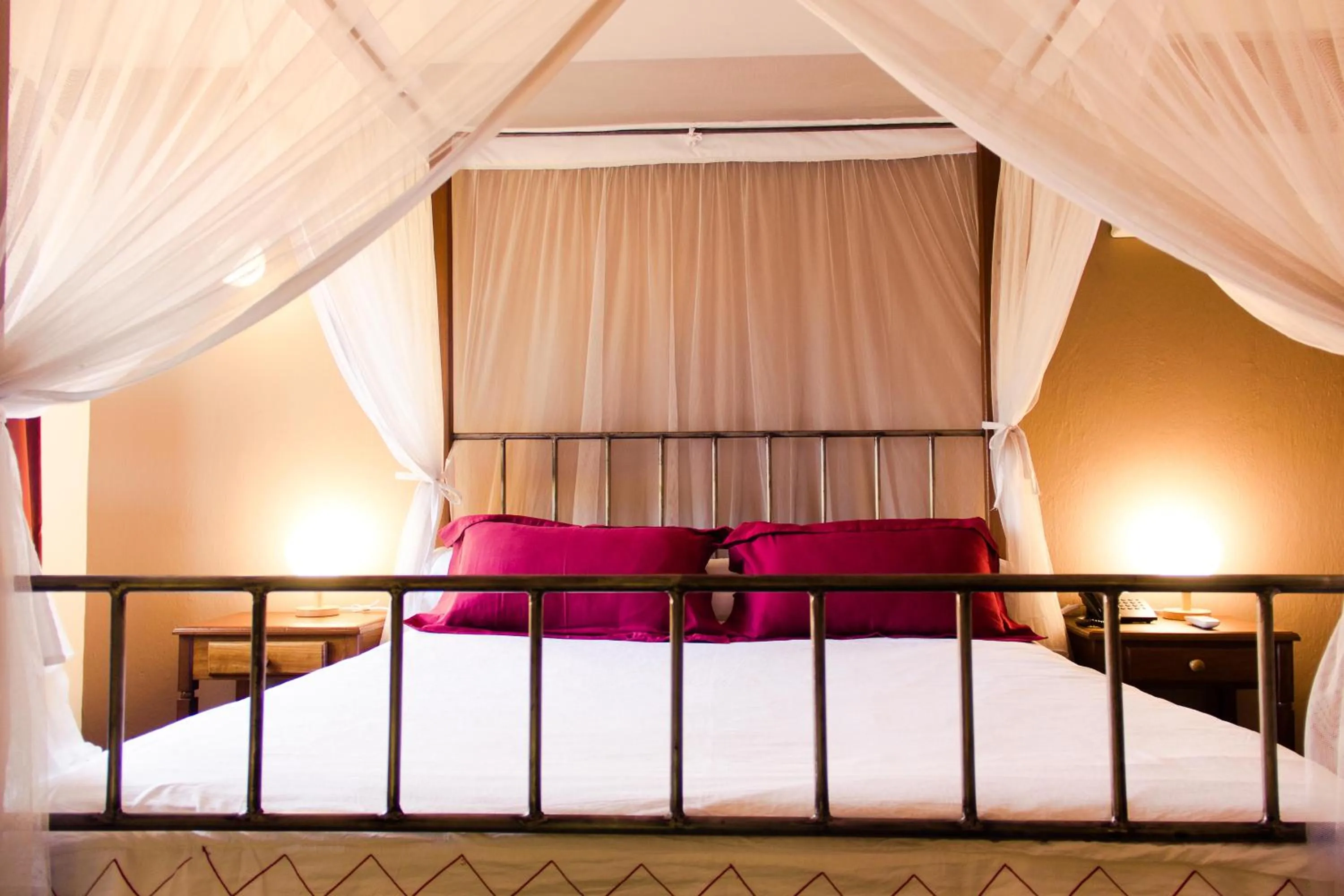 Bed in Hotel Bougainviller