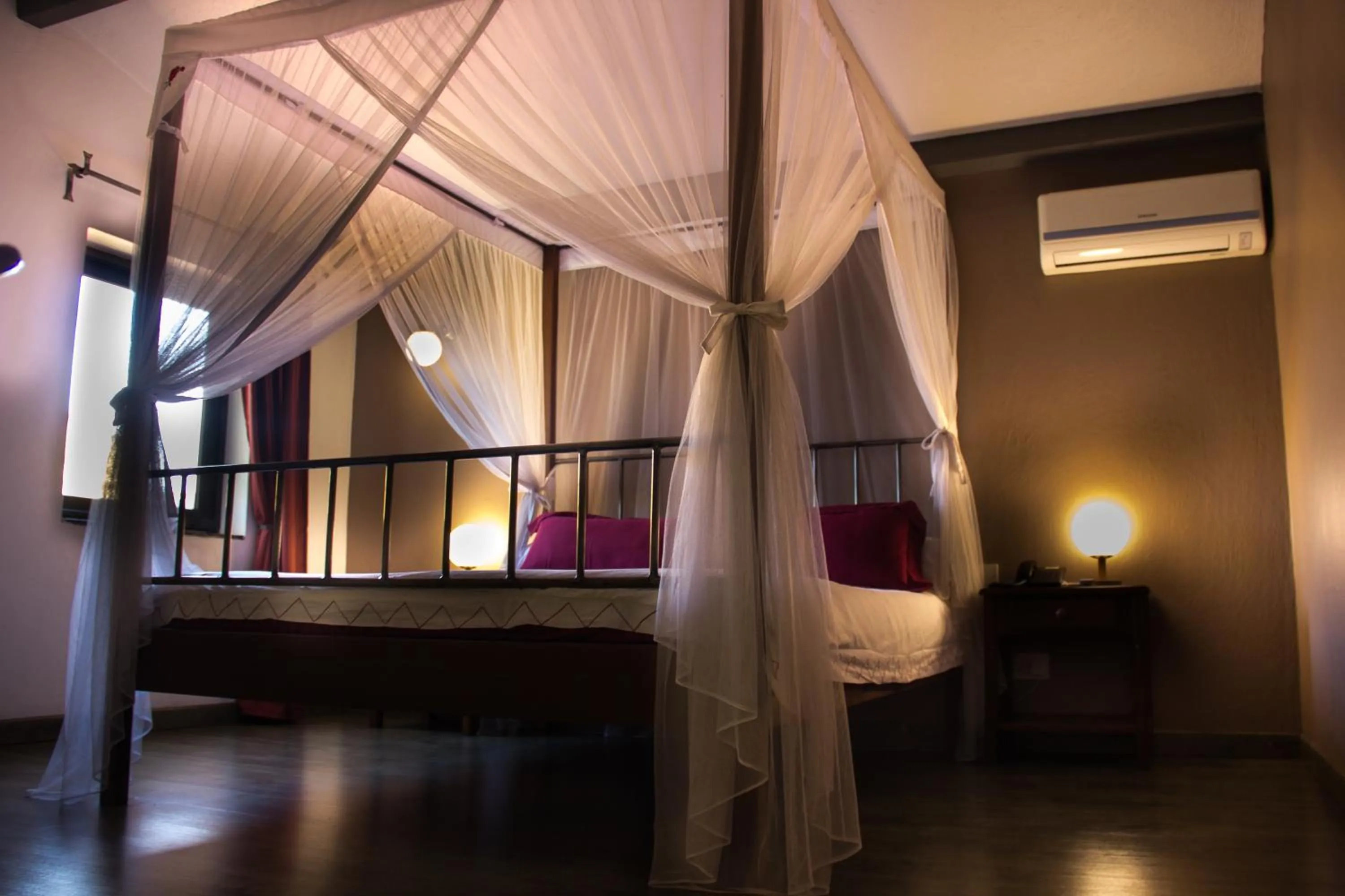 Bed in Hotel Bougainviller