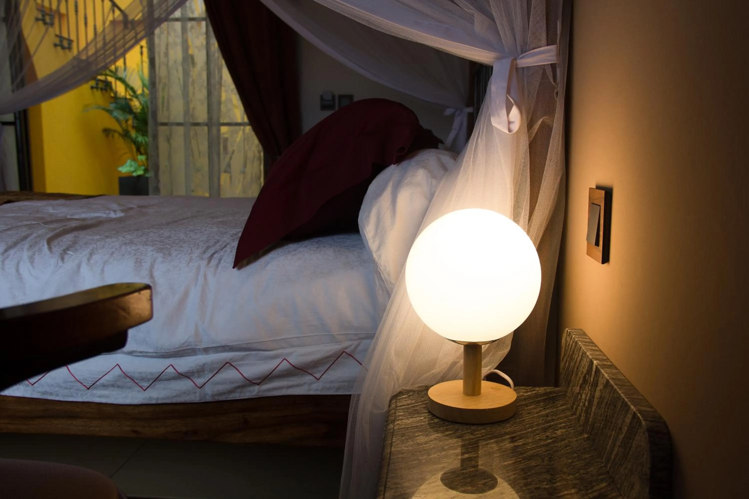 Bed in Hotel Bougainviller