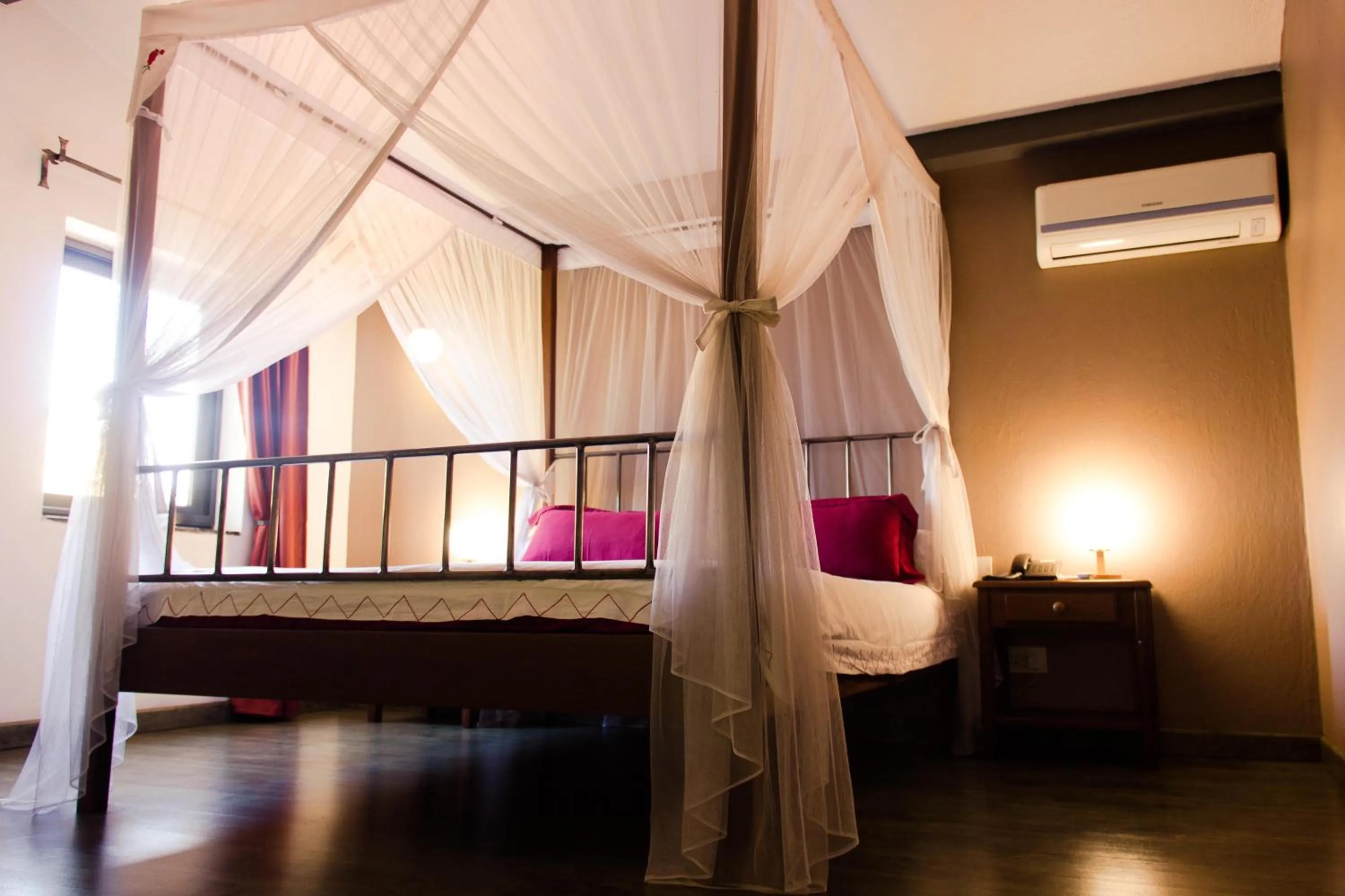 Bed in Hotel Bougainviller