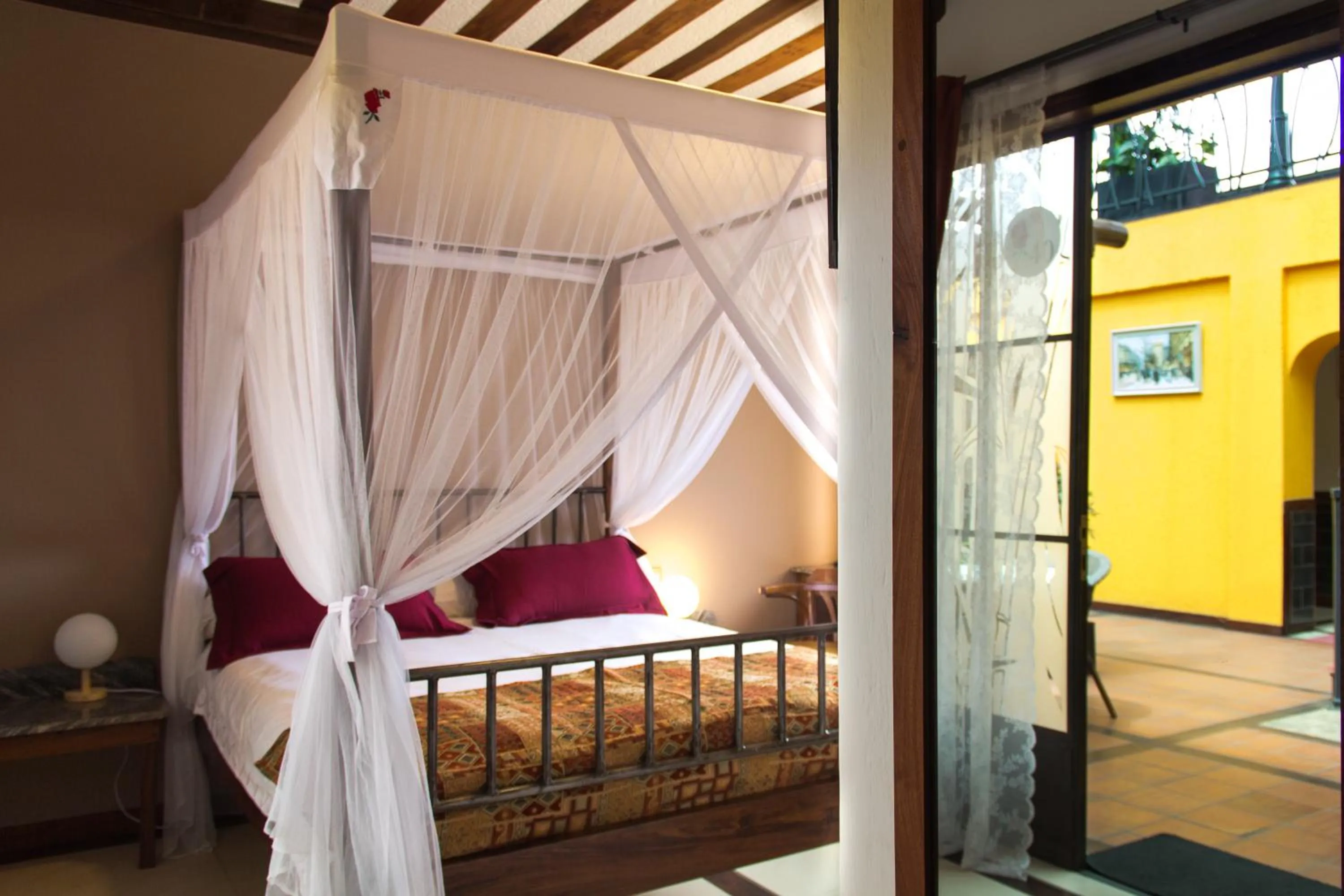 Bed in Hotel Bougainviller