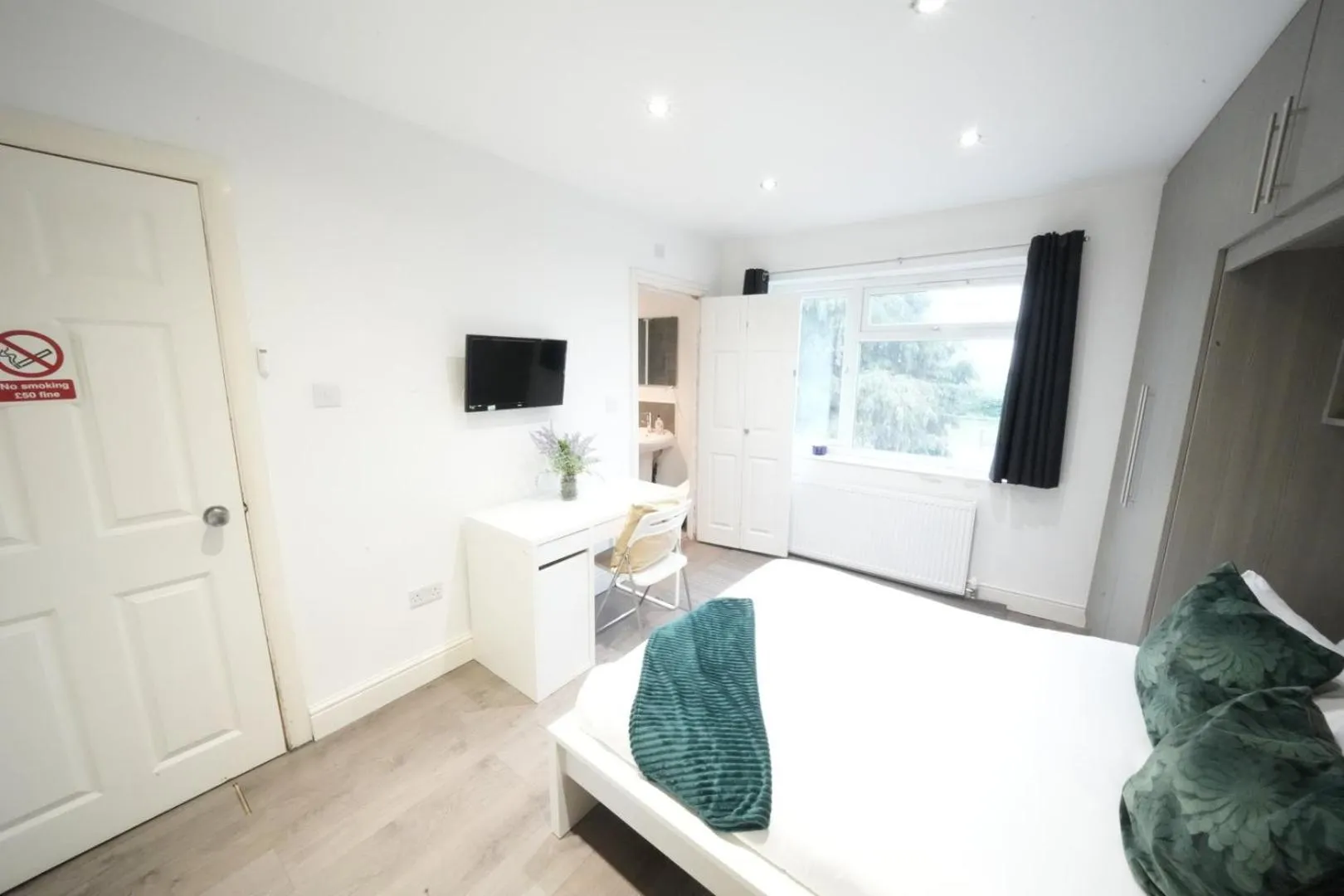 Bed in Grand Airport Ensuites