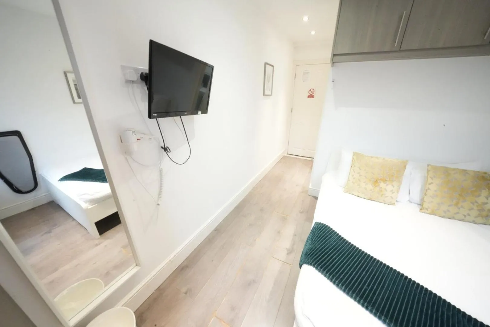 Bed in Grand Airport Ensuites