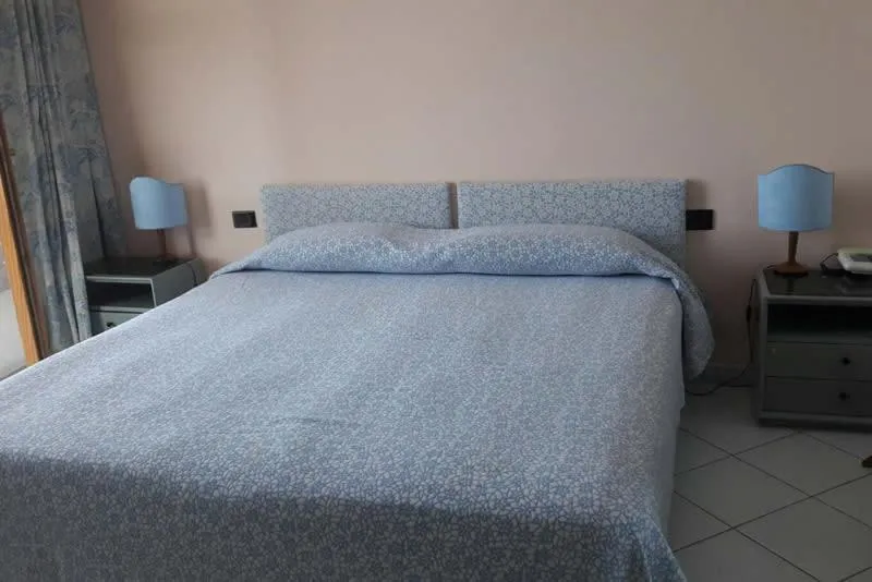 Bedroom in Hotel La Tartaruga