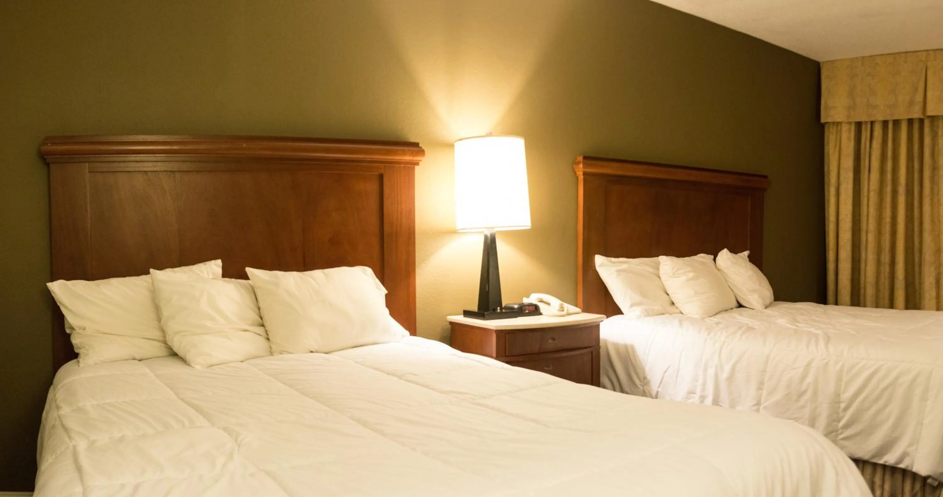 Bed in Aderi Hotel Near Casino