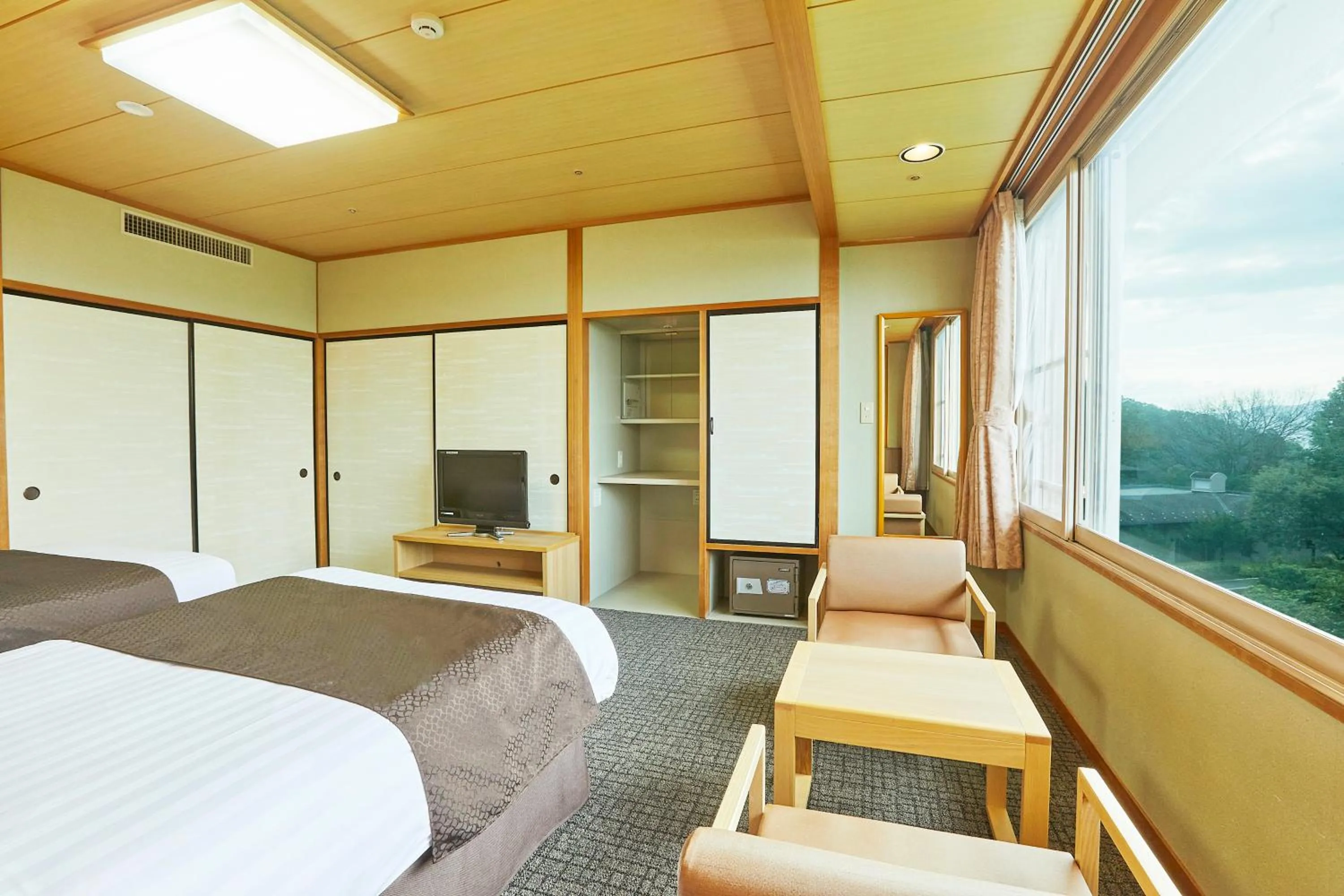 Photo of the whole room, Bed in KAMENOI HOTEL Fukui
