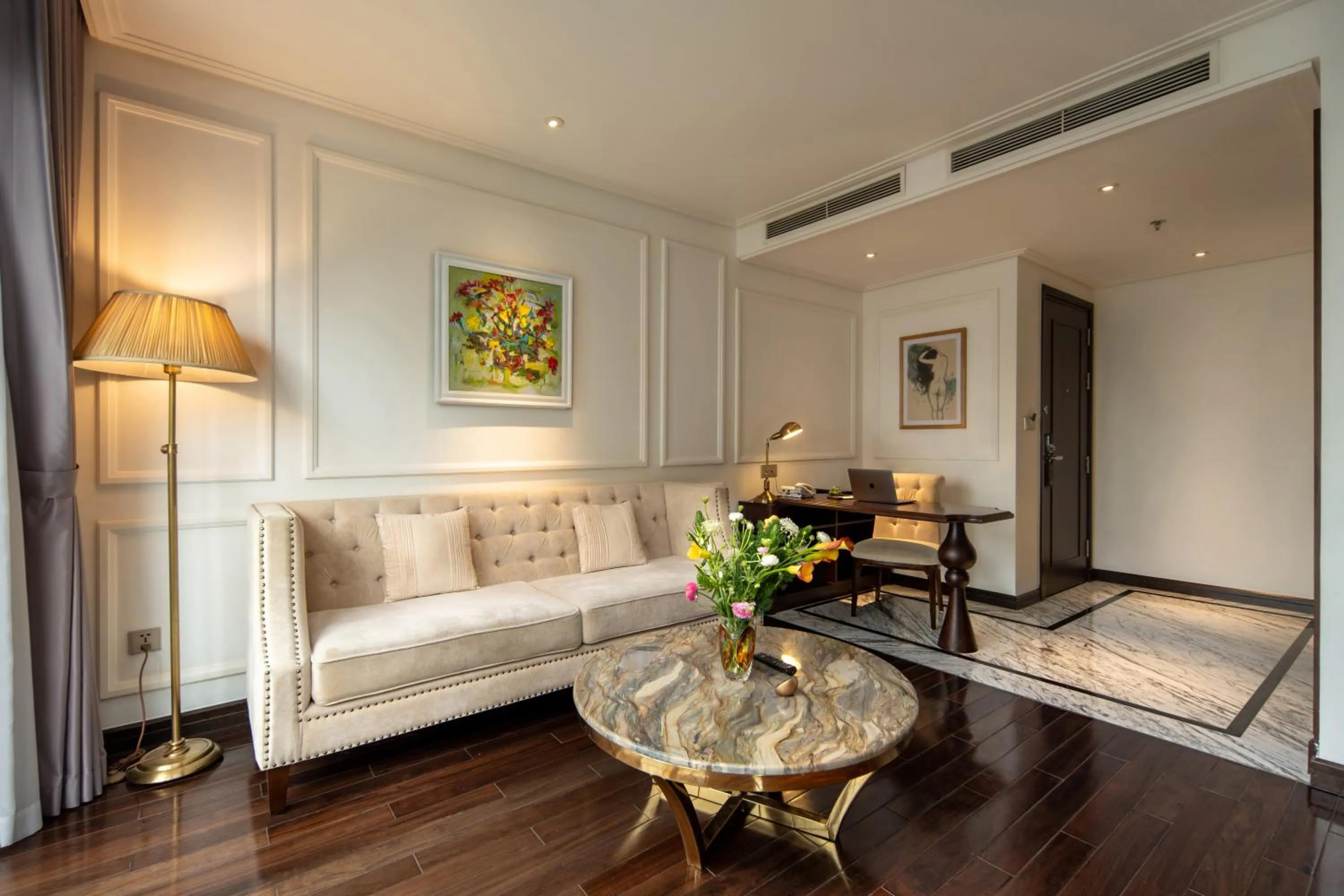 Living room, Bed in Anatole Hotel Hanoi