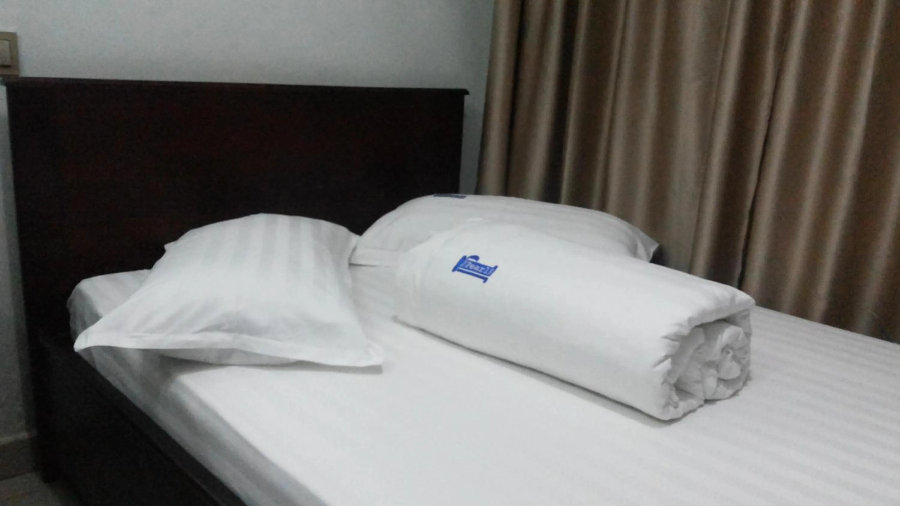 Bed in The Pearl Inn