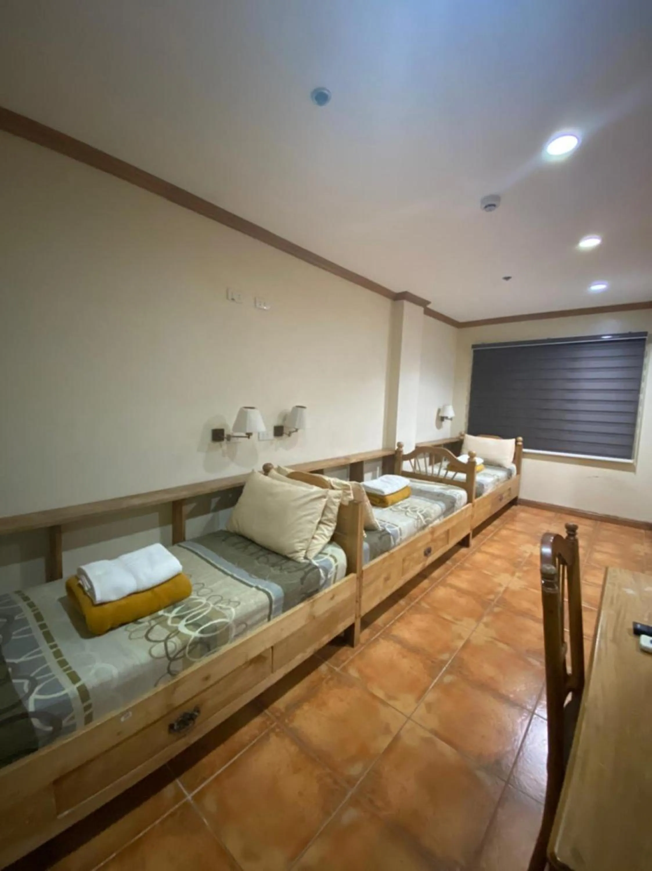 Bedroom in OYO 797 Brickwood Suites