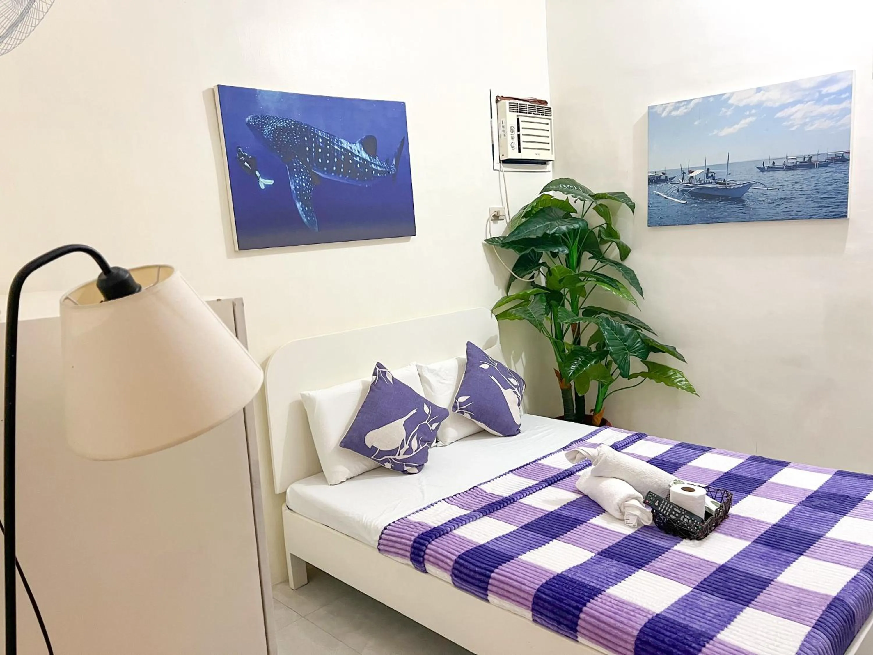 Bed in Casa Bicolandia Suites