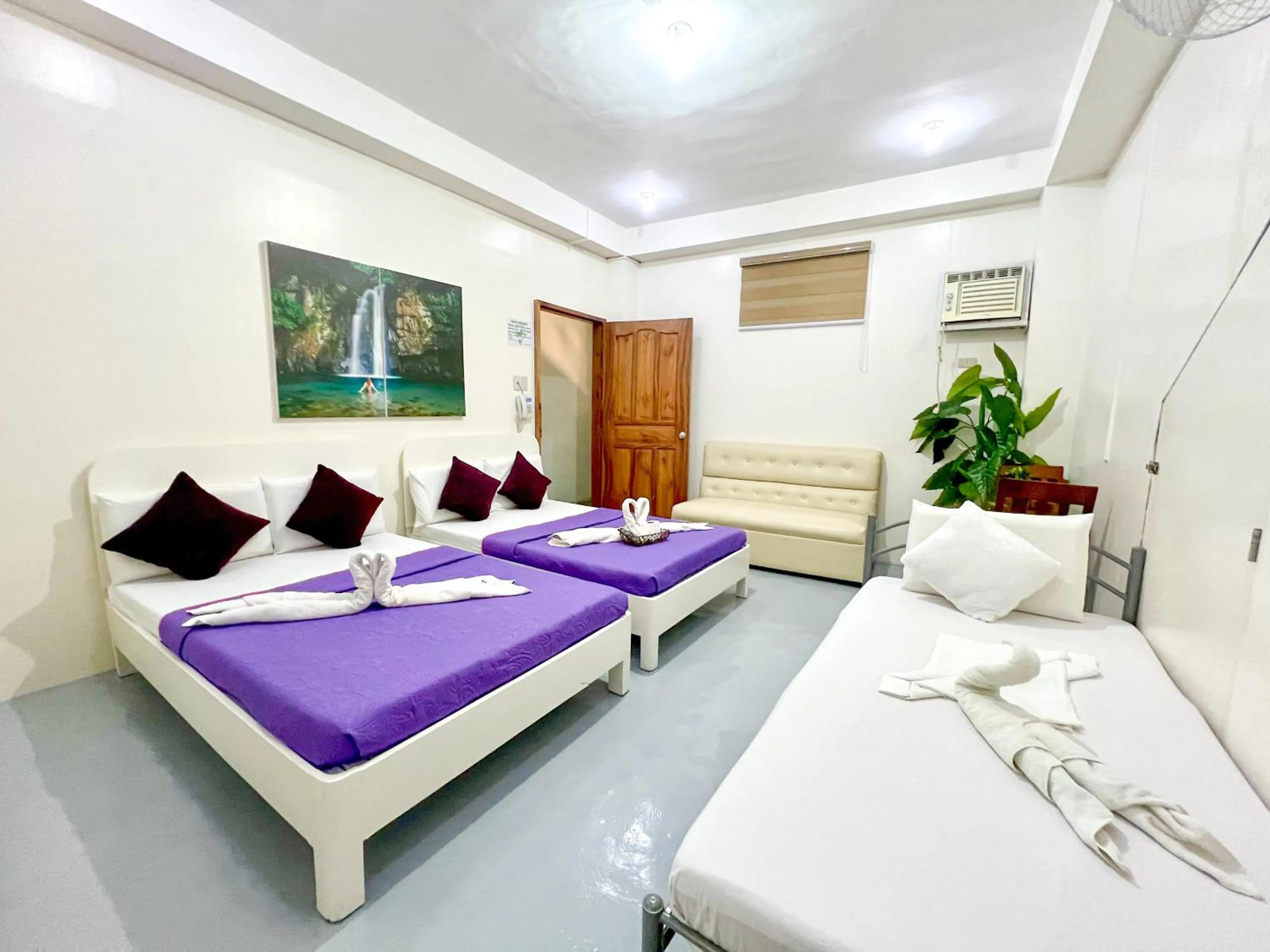 Bed in Casa Bicolandia Suites