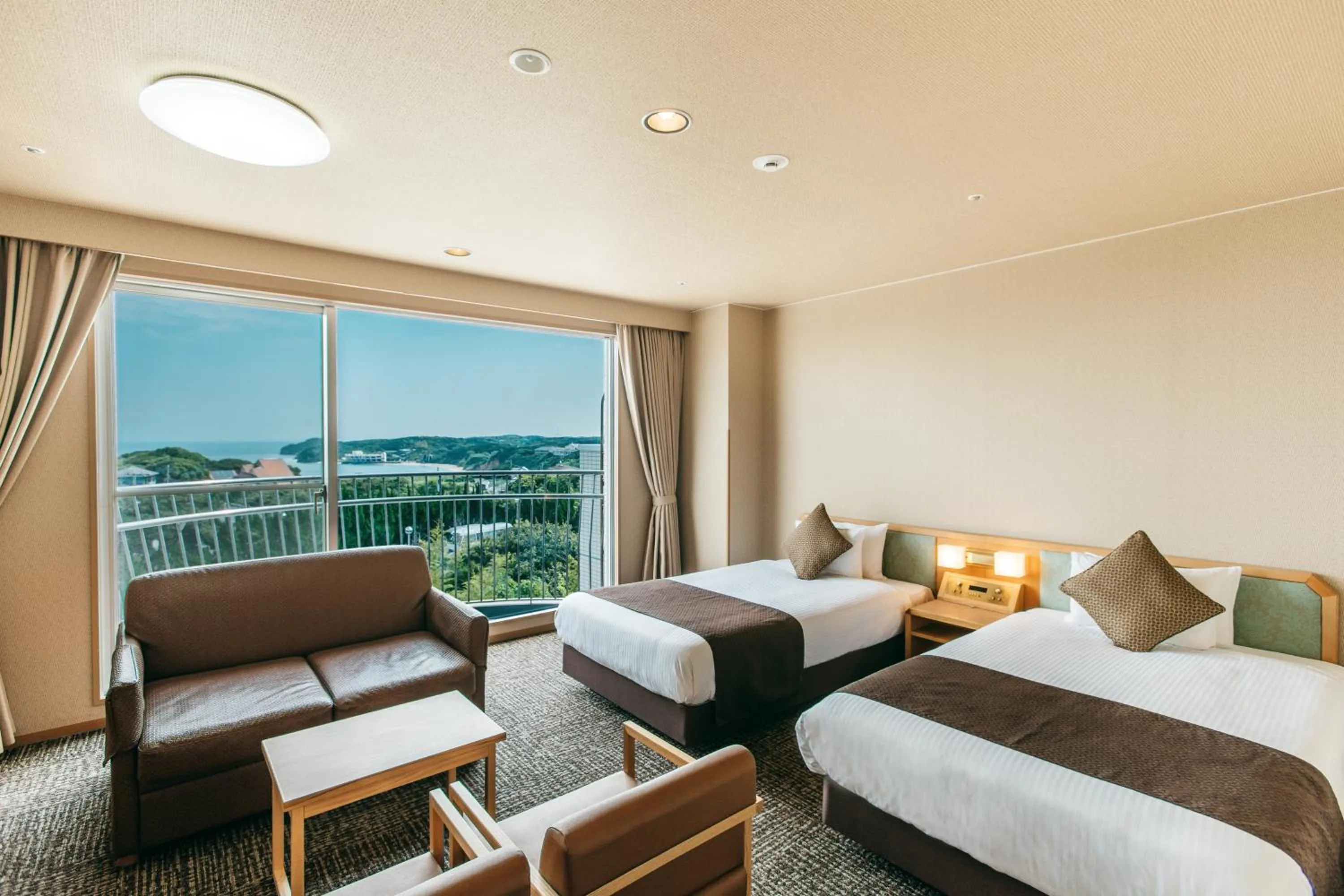 Bed in KAMENOI HOTEL Genkainada