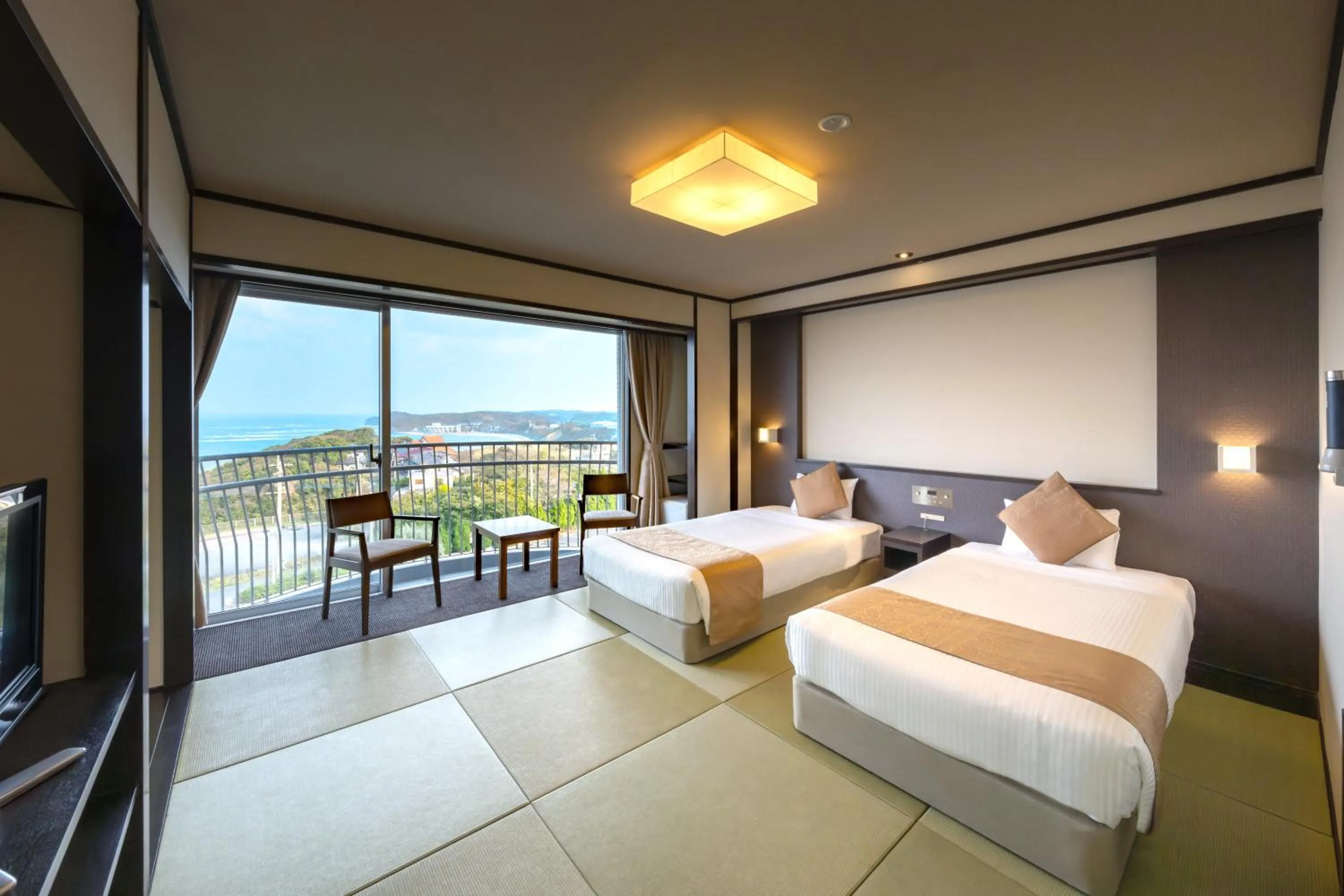 Photo of the whole room, Bed in KAMENOI HOTEL Genkainada