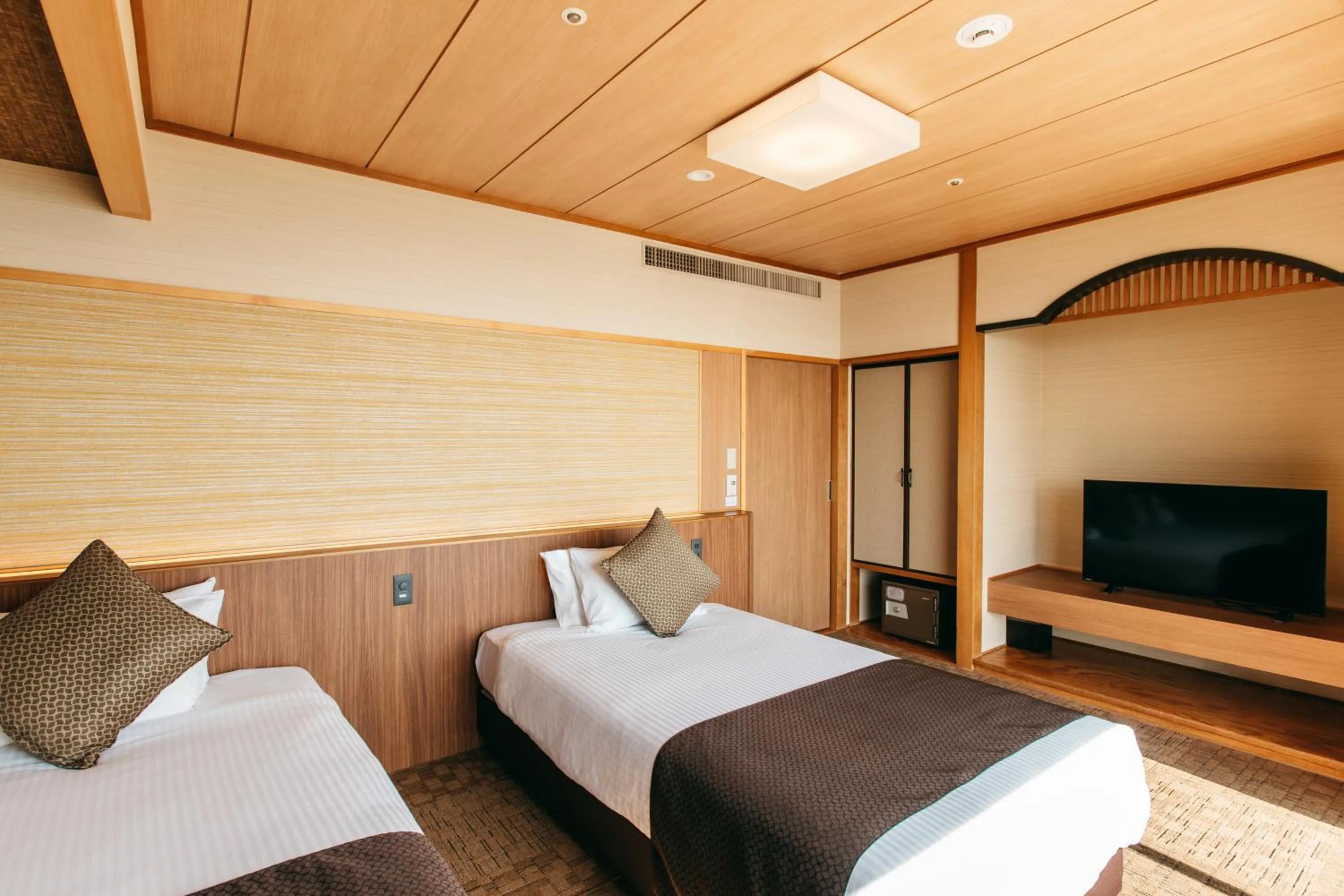 Photo of the whole room, Bed in KAMENOI HOTEL Genkainada