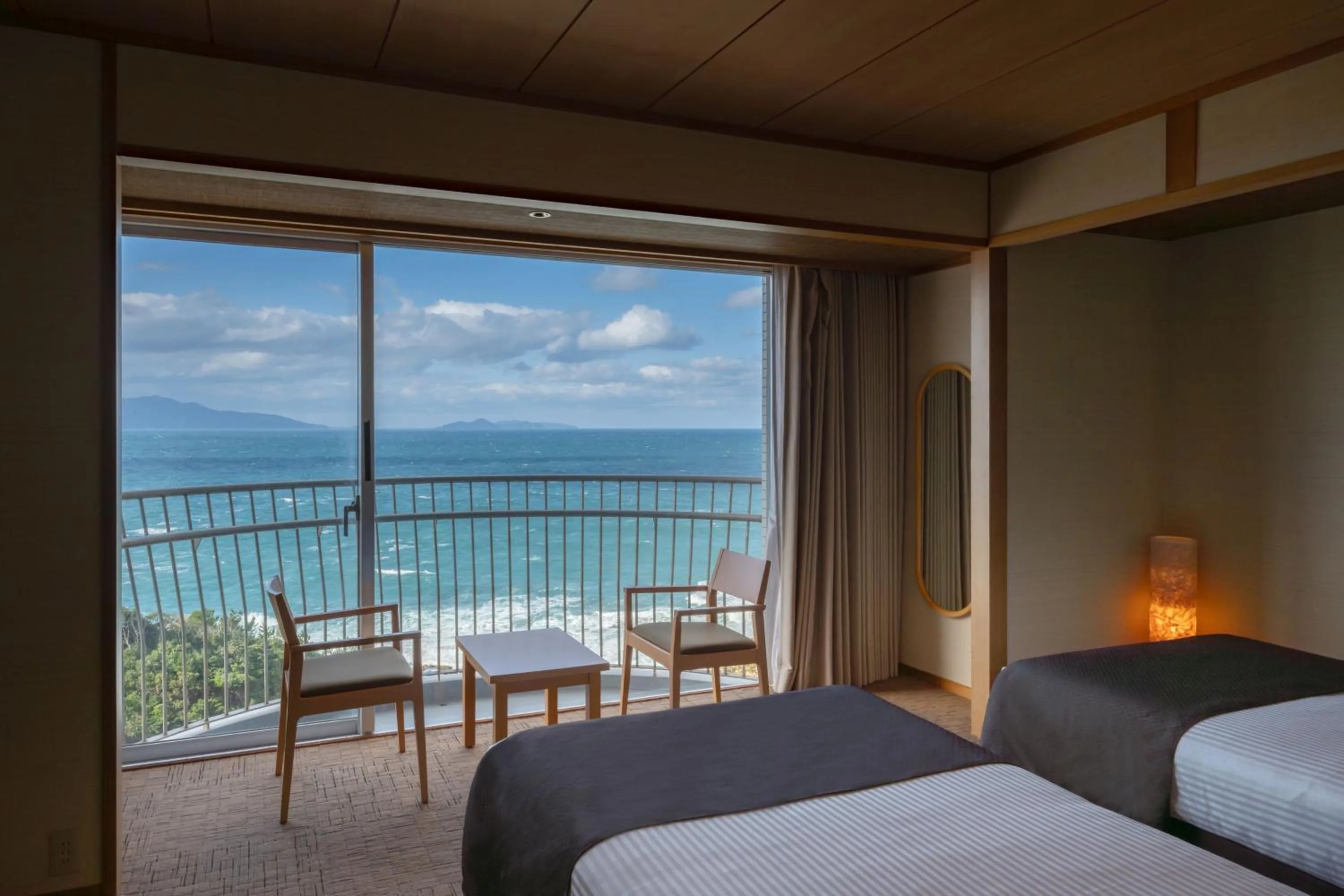 Photo of the whole room, Bed in KAMENOI HOTEL Genkainada
