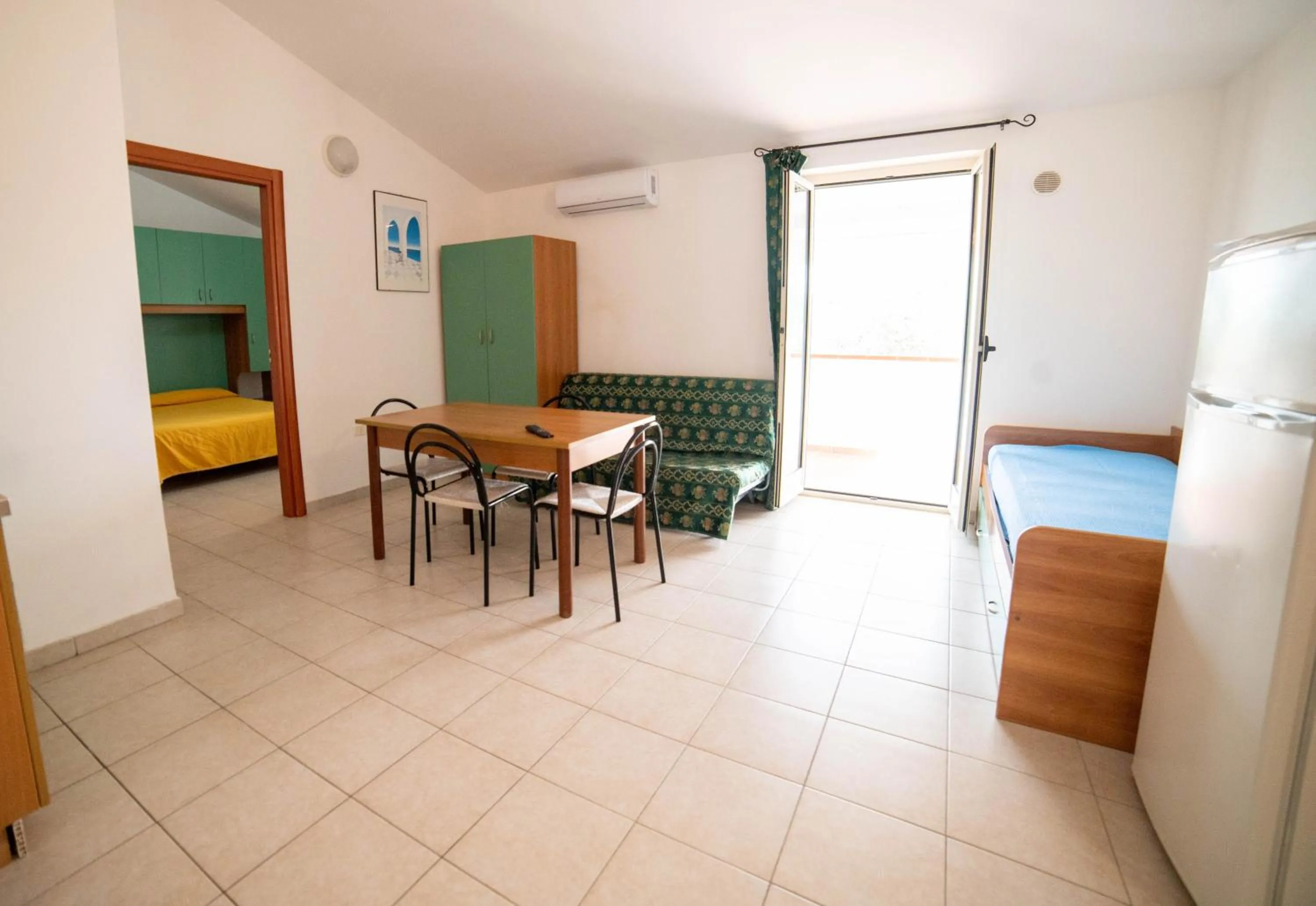 Living room, Bed in Residence Il Falco