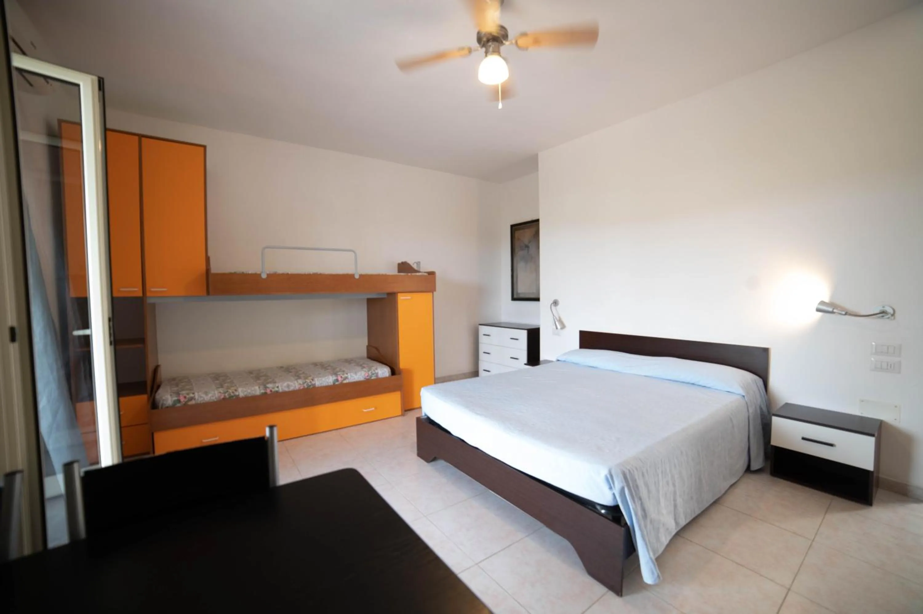 Photo of the whole room, Bed in Residence Il Falco