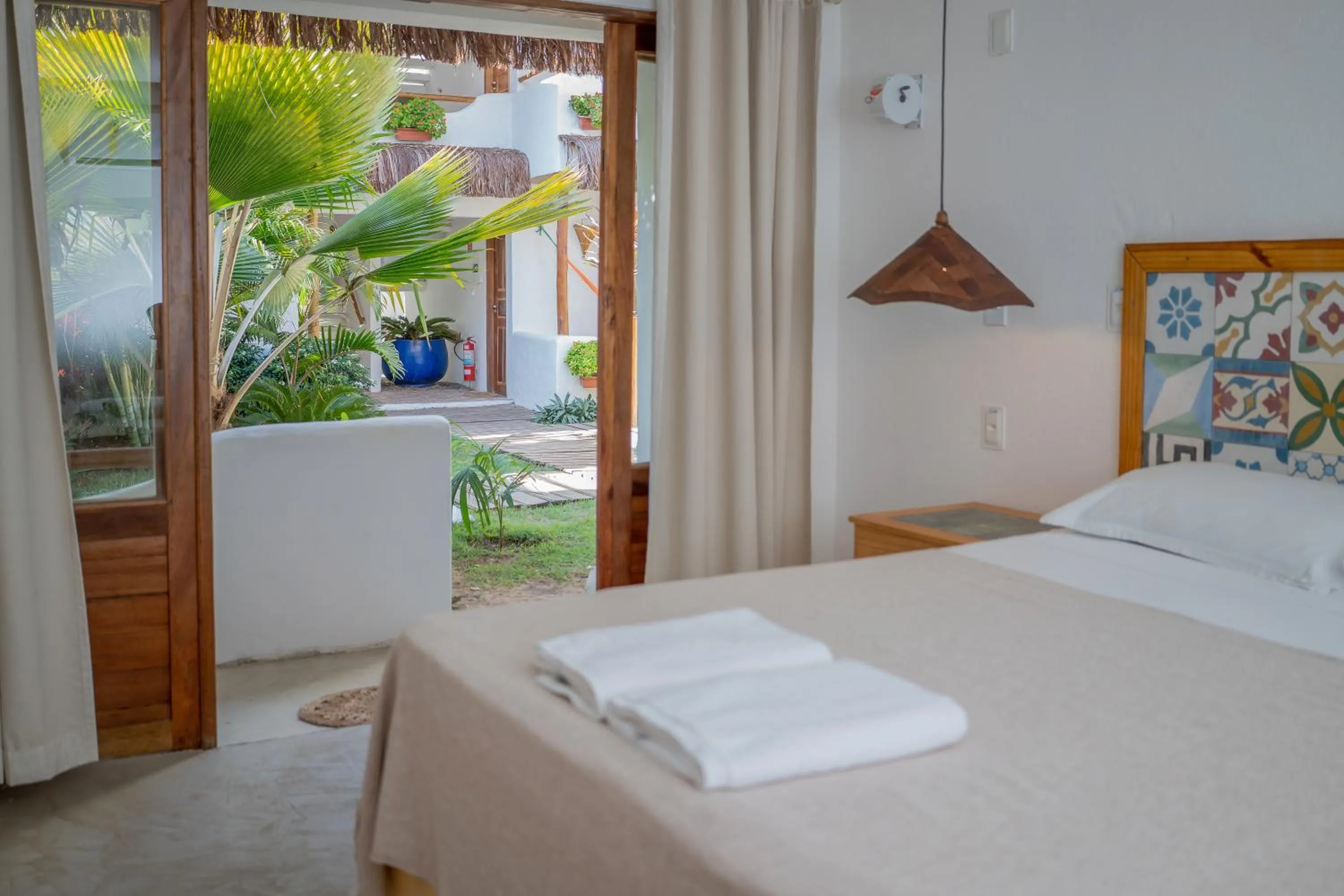 Bed in Pousada Chez Toi