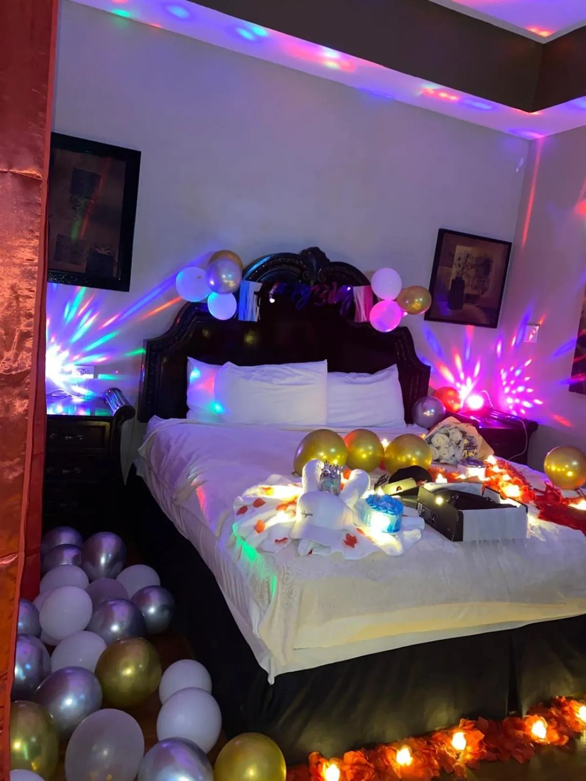 Bed in Hotel Royal Blue & Golf Cart Rental