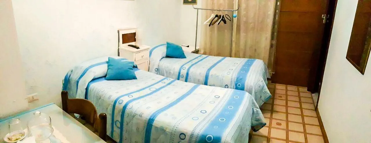 Bed in Beb I Delfini Di Casa Paola
