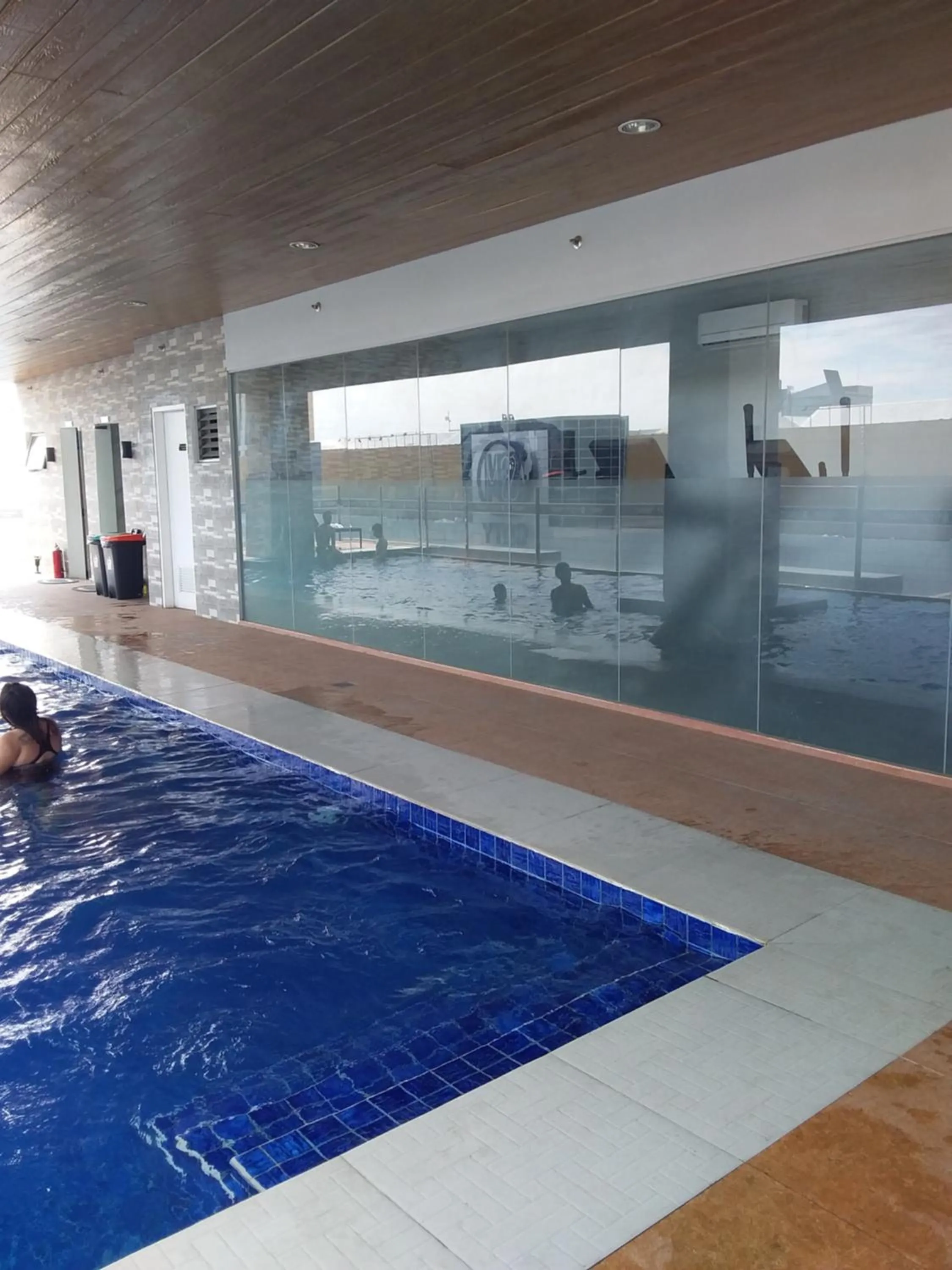 Swimming pool in AJ Sundiva Tower w balcony