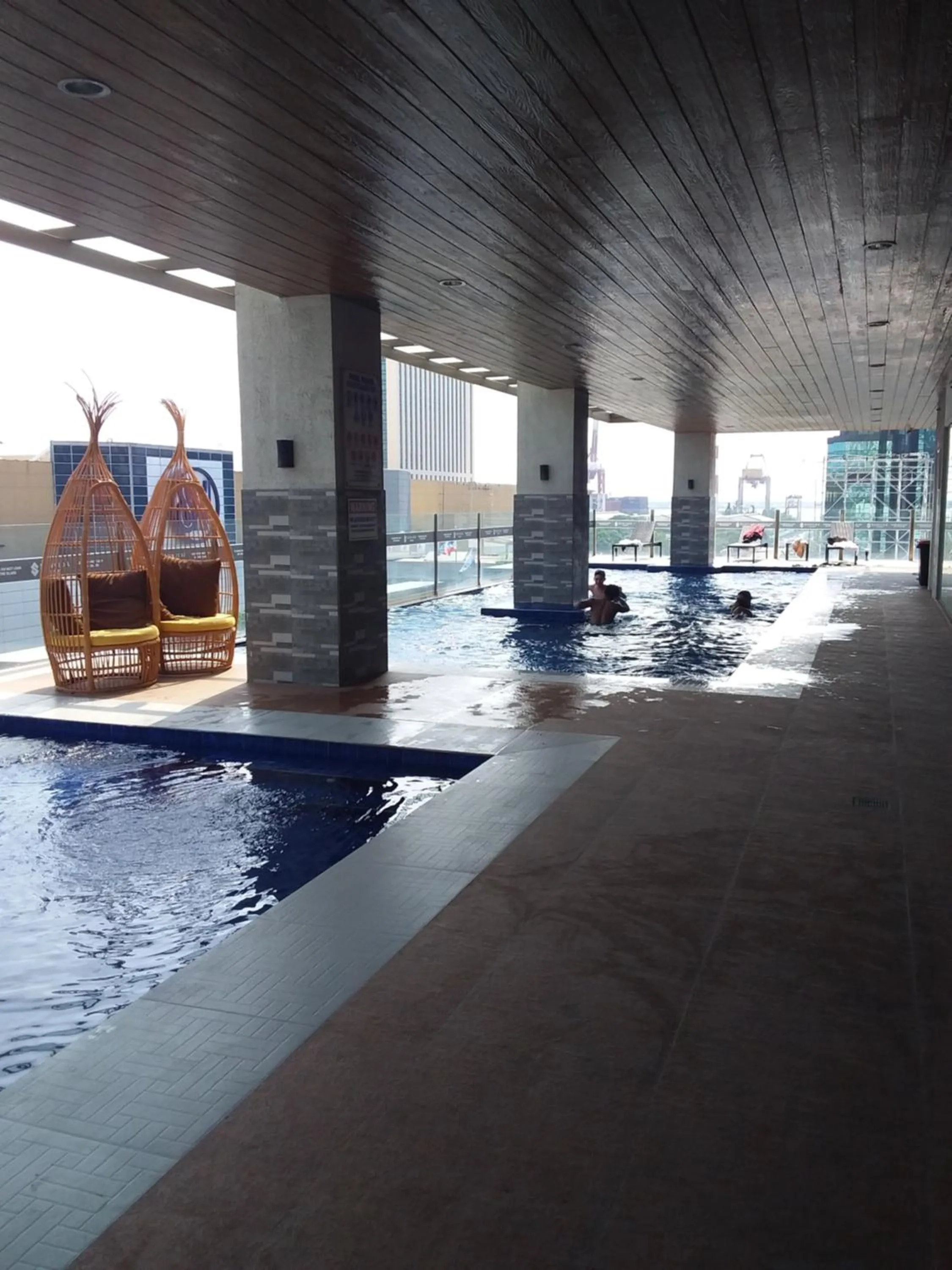 Swimming pool in AJ Sundiva Tower w balcony