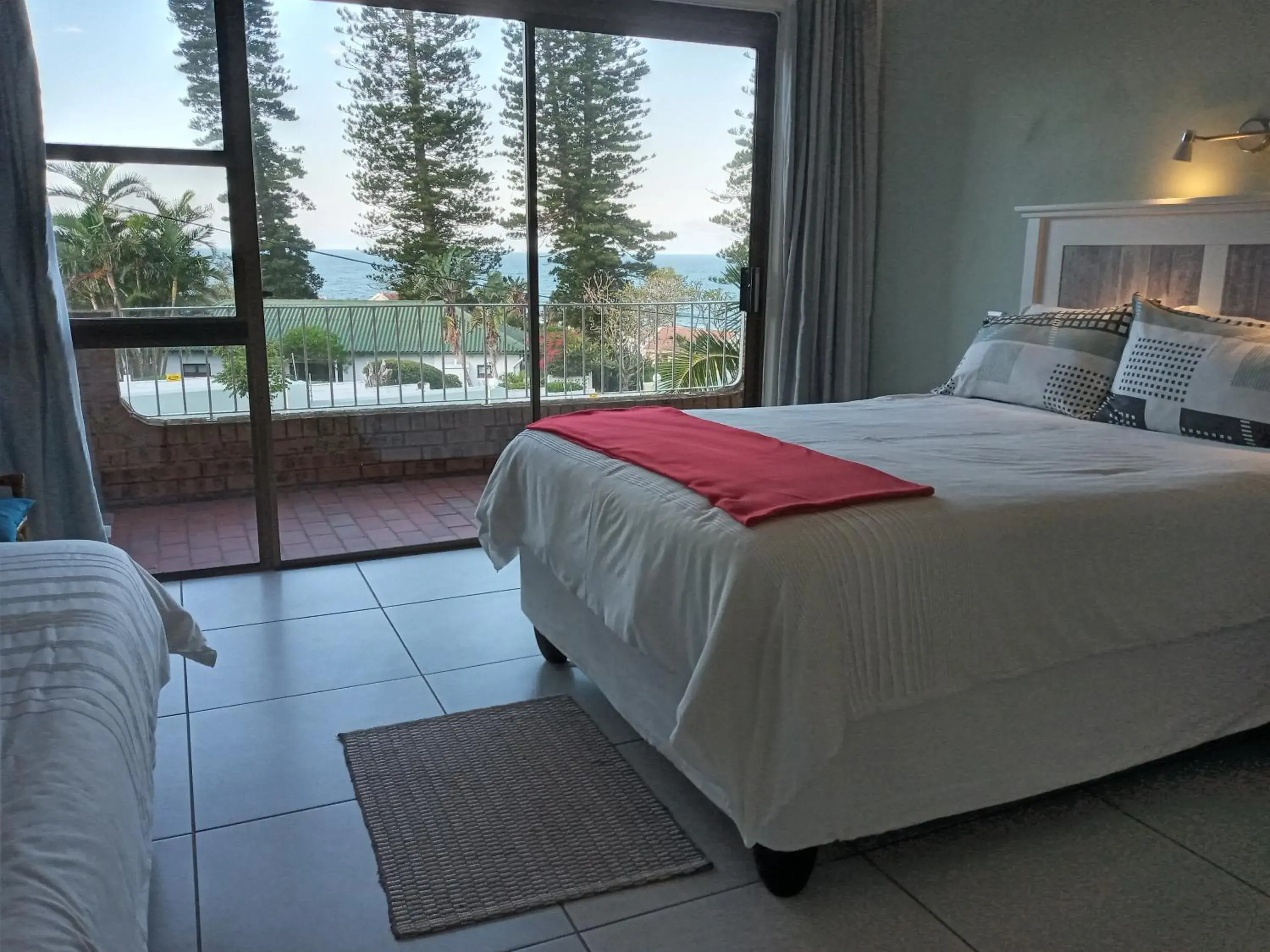 Double Room with Balcony and Sea View in Rockview Guest House Double Room with Balcony and Sea View in Rockview Guest House