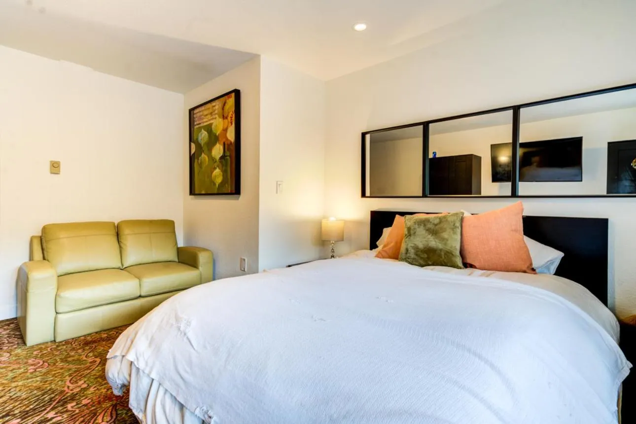 Bed in INNhale Resort and Spa