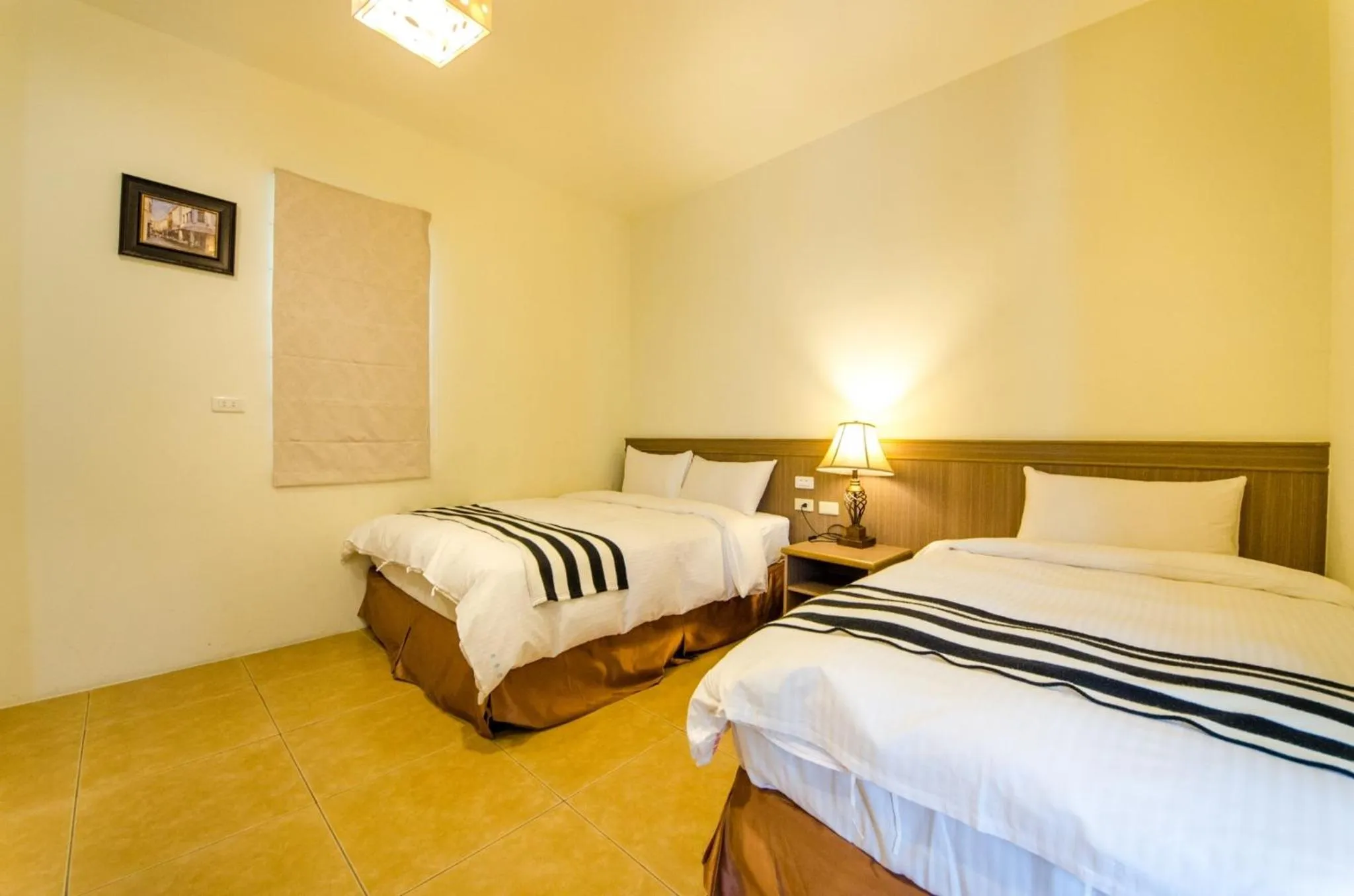 Bed in Butchard Villas