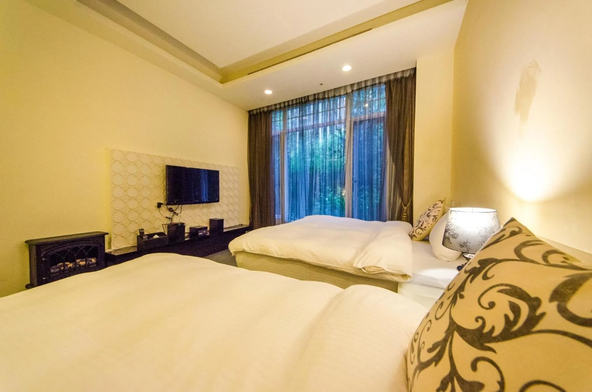 Bed in Butchard Villas