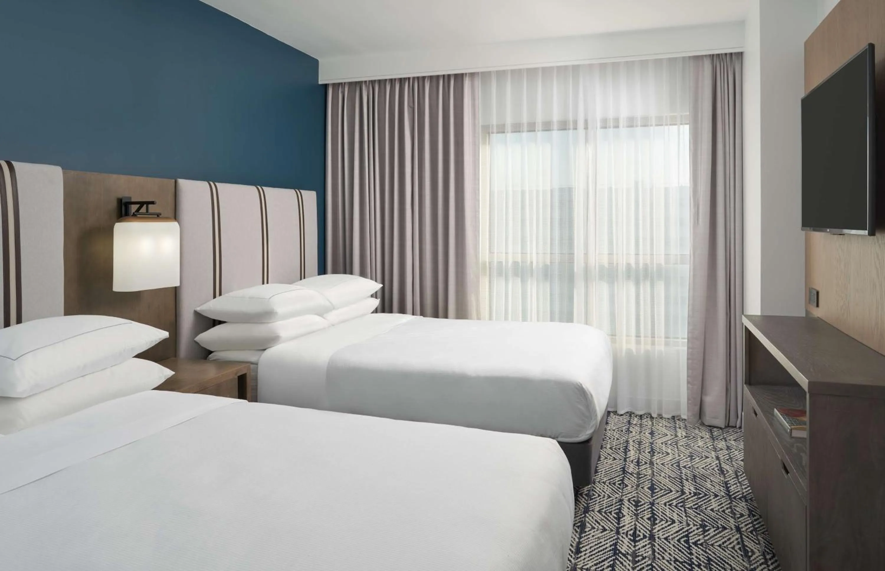 Bed in The Chifley Houston, Tapestry Collection by Hilton