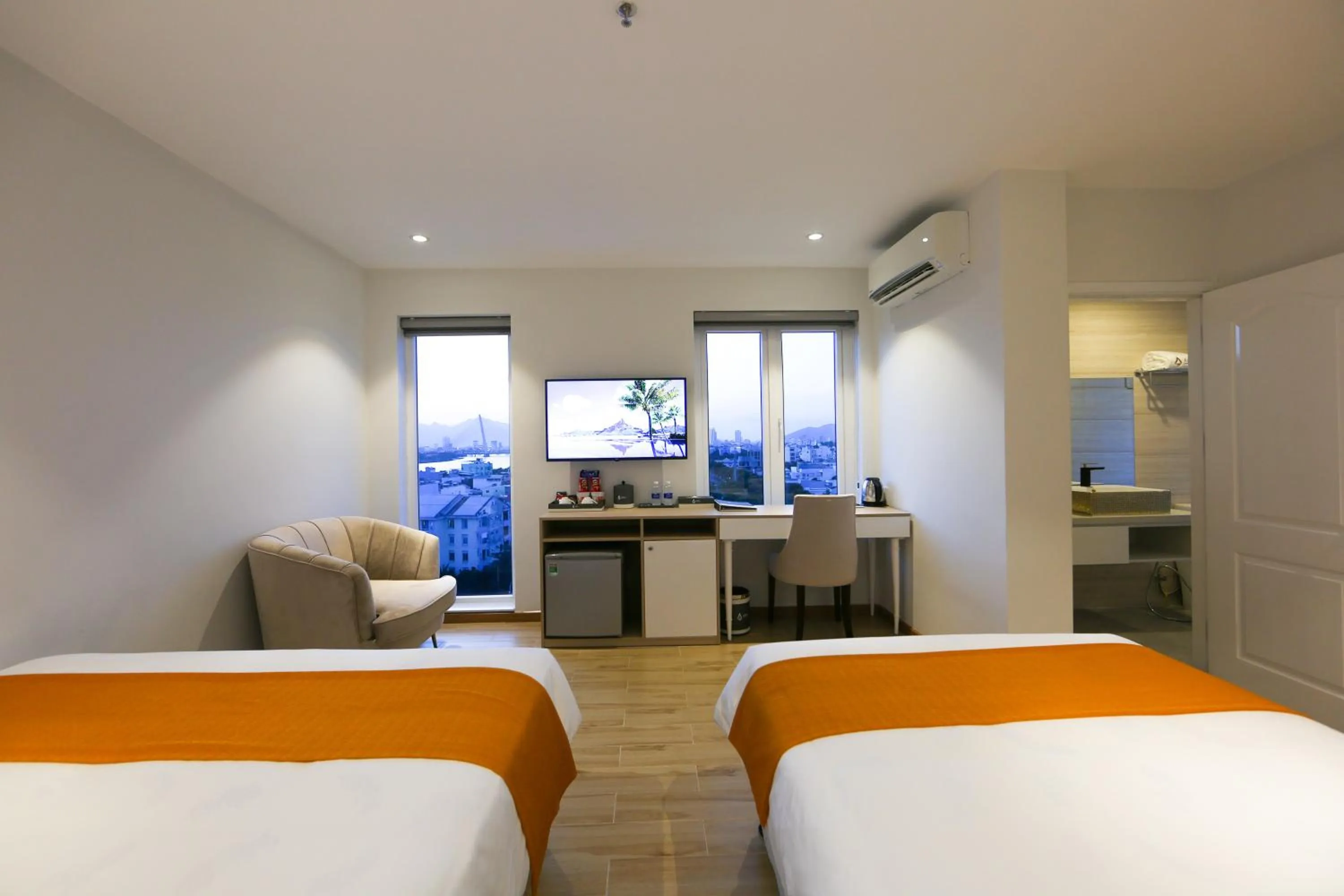 Bed in RHM Luxury Hotel And Suite