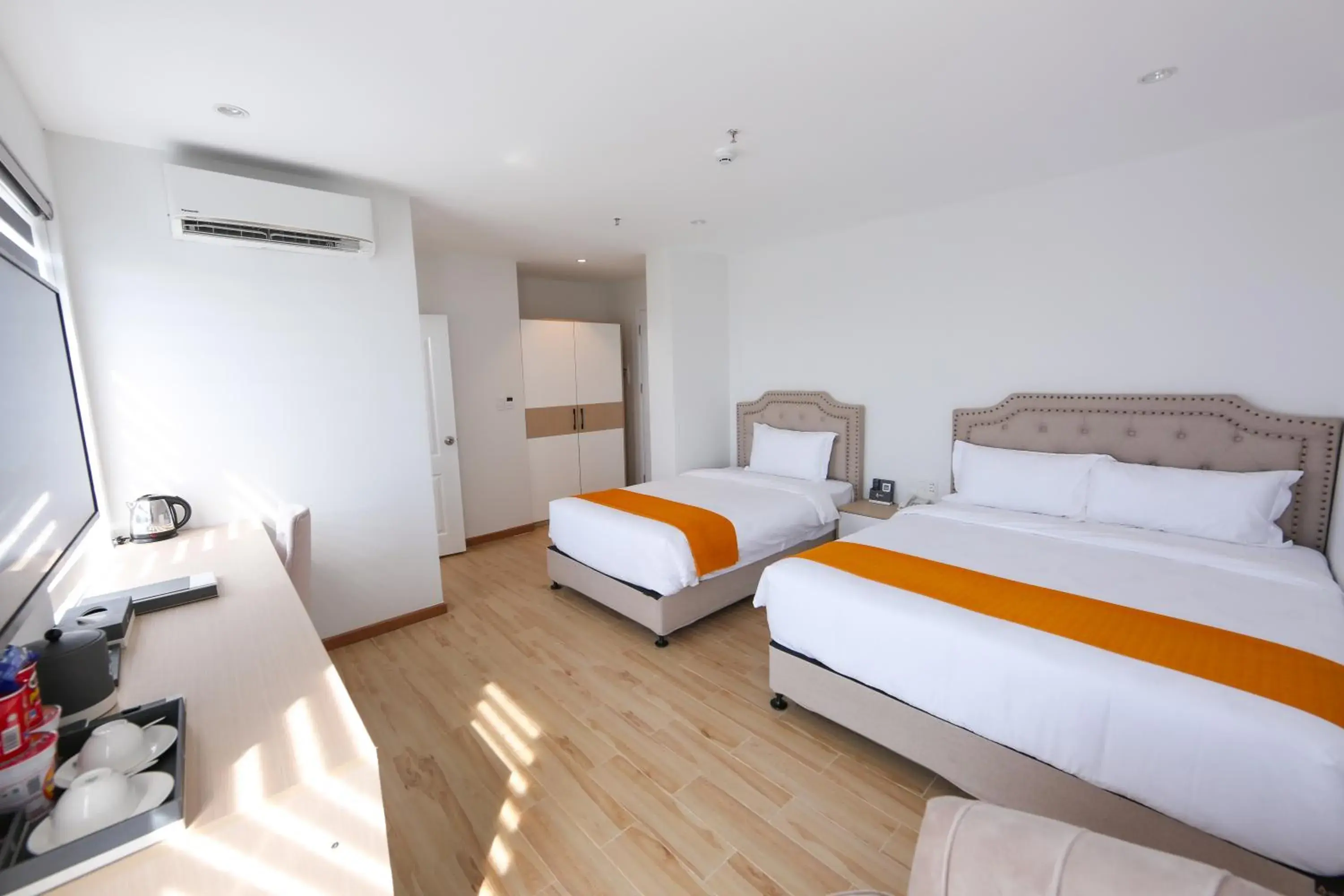 Triple Room with City View in RHM Luxury Hotel And Suite Triple Room with City View in RHM Luxury Hotel And Suite