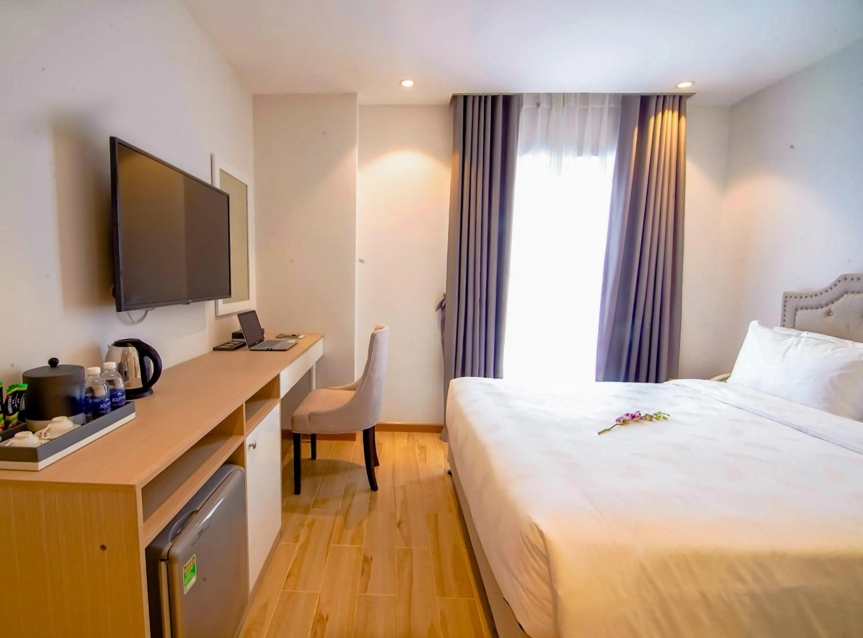 Bed in RHM Luxury Hotel And Suite