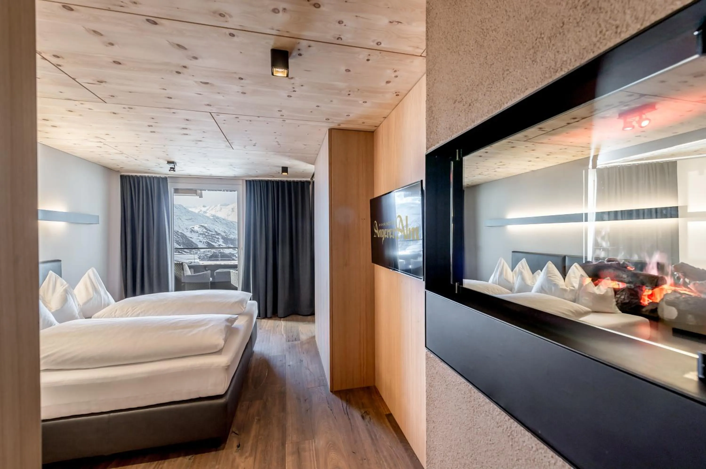 Bed in Hotel Angerer Alm