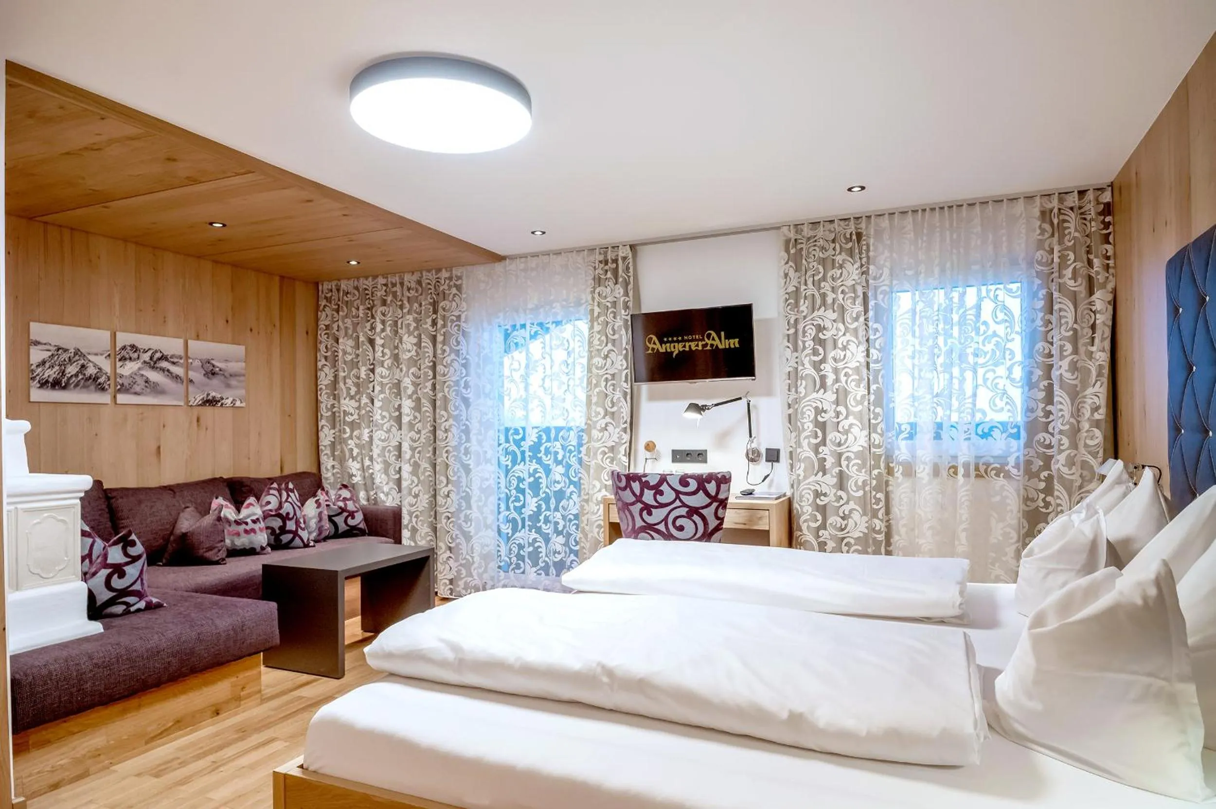 Bed in Hotel Angerer Alm