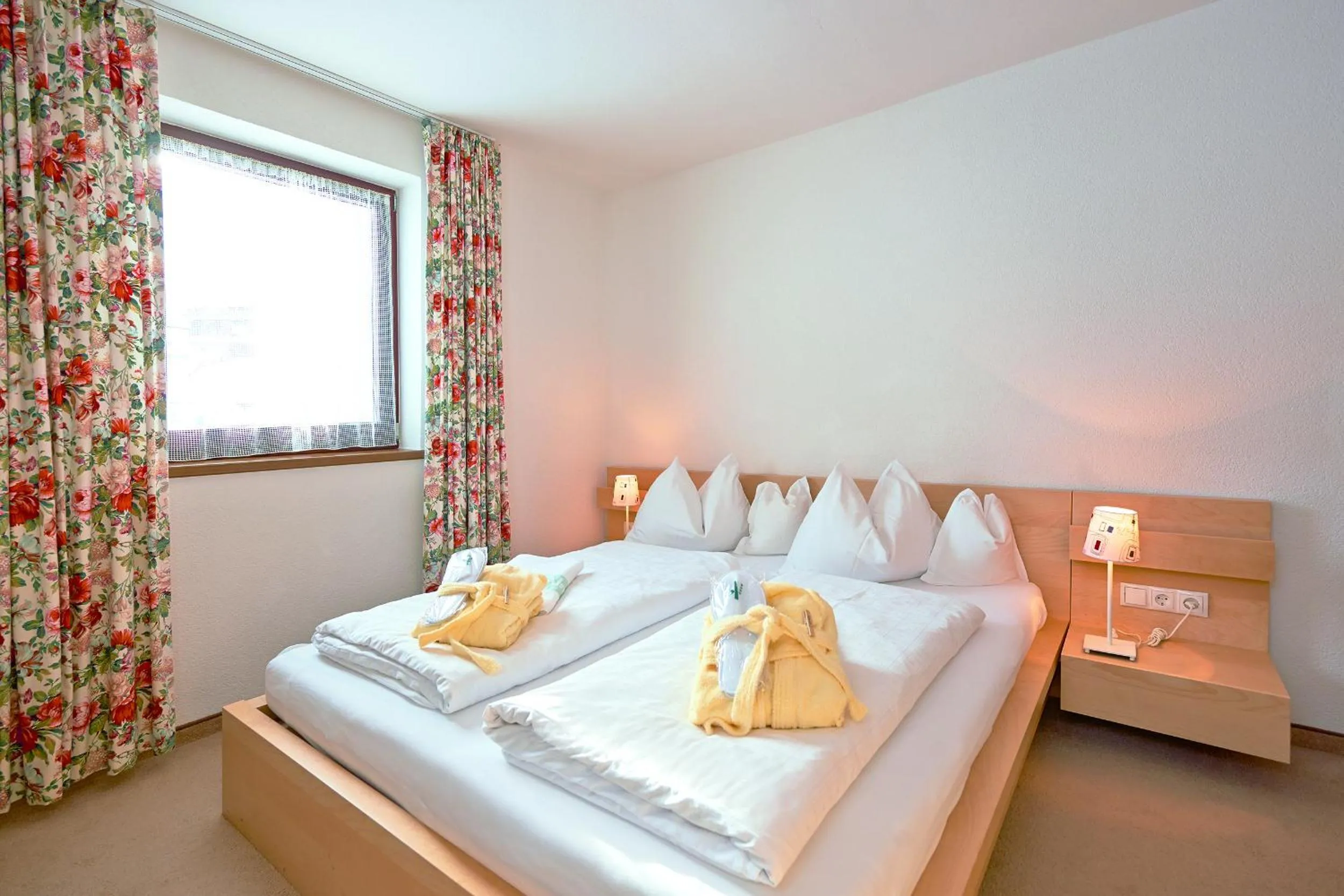 Bed in Hotel Angerer Alm