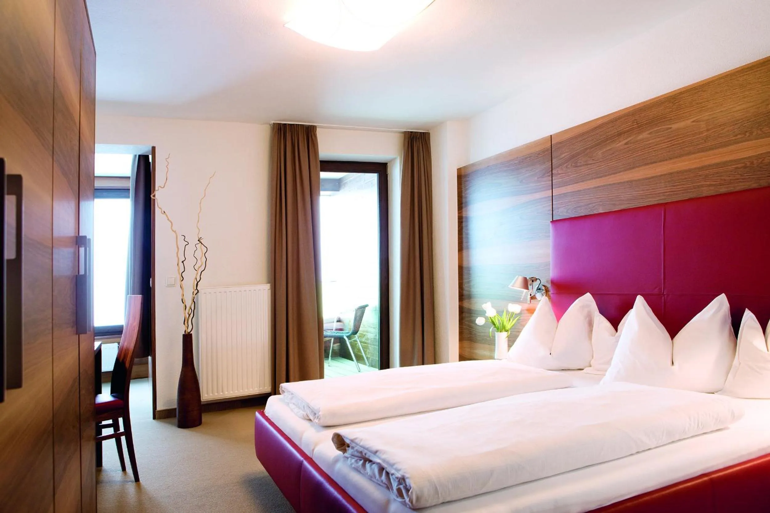 Photo of the whole room, Bed in Hotel Angerer Alm