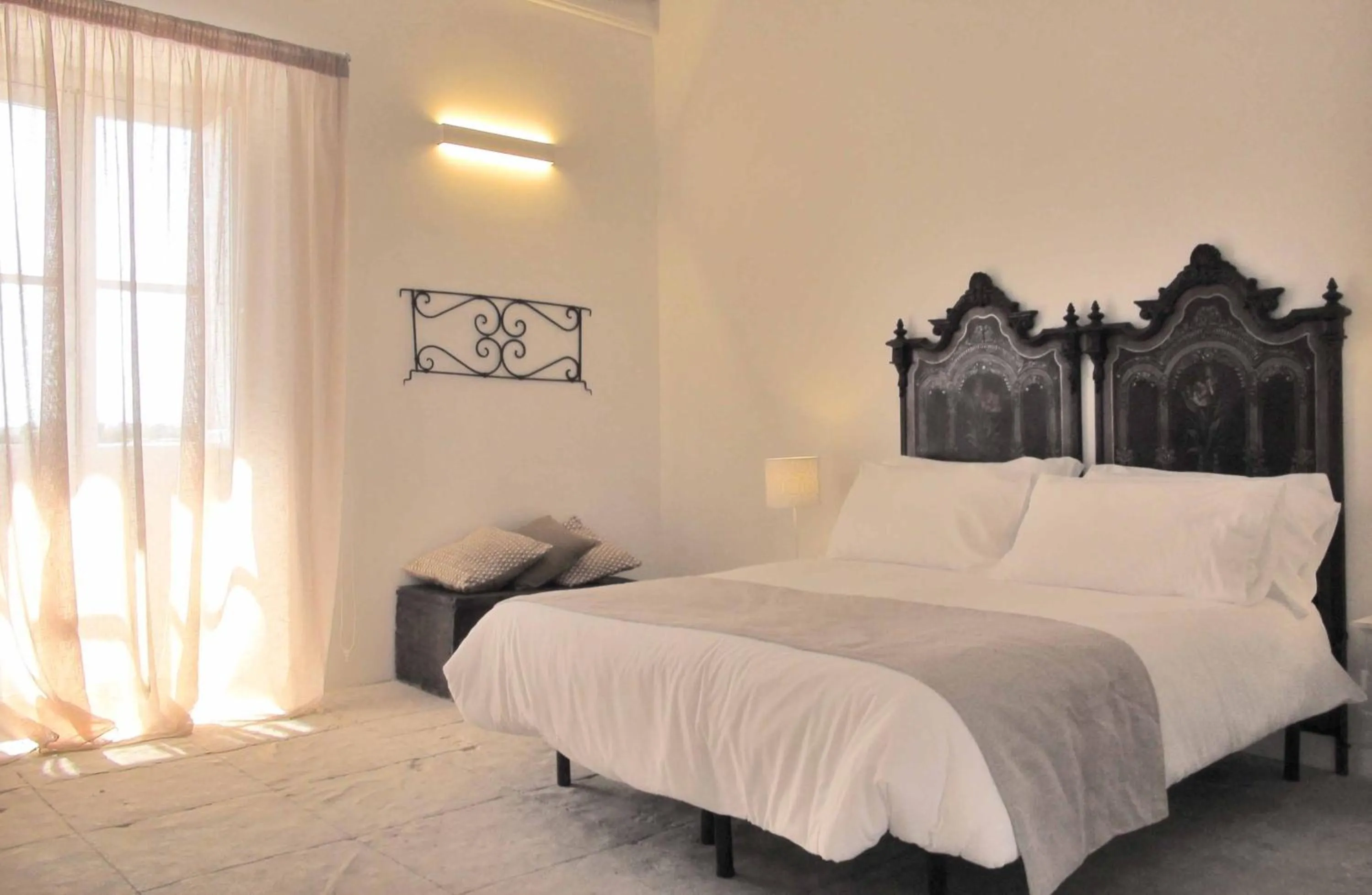 Photo of the whole room, Bed in Baglio Siciliamo Country House