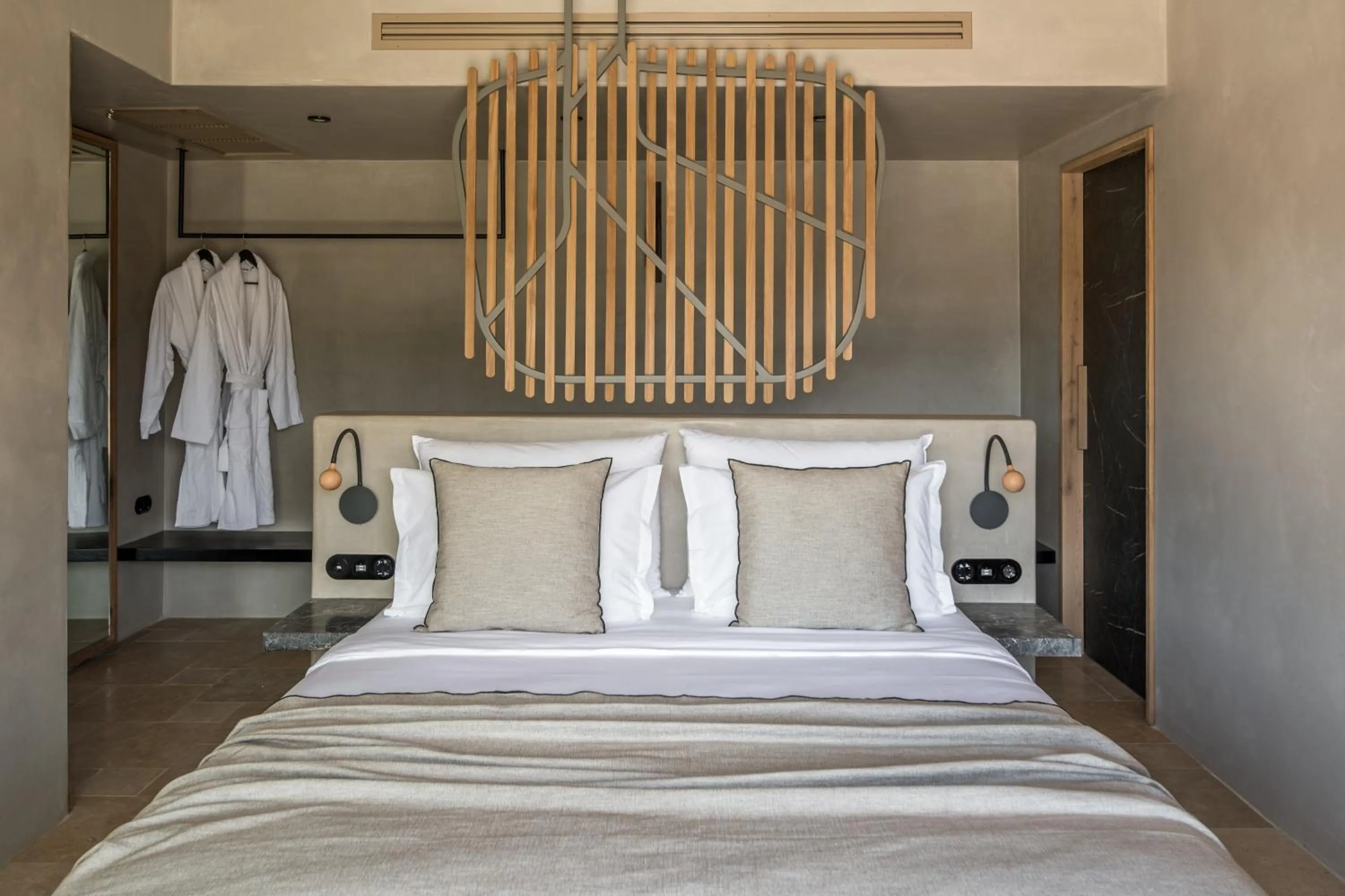 Bed in Acro Suites - A Wellbeing Resort
