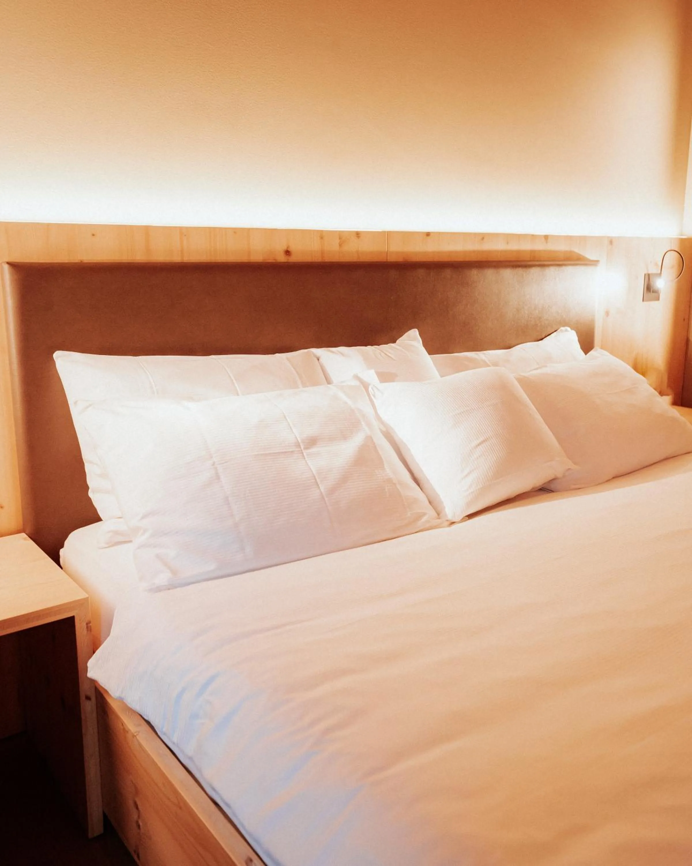 Bed in Campra Alpine Lodge & Spa