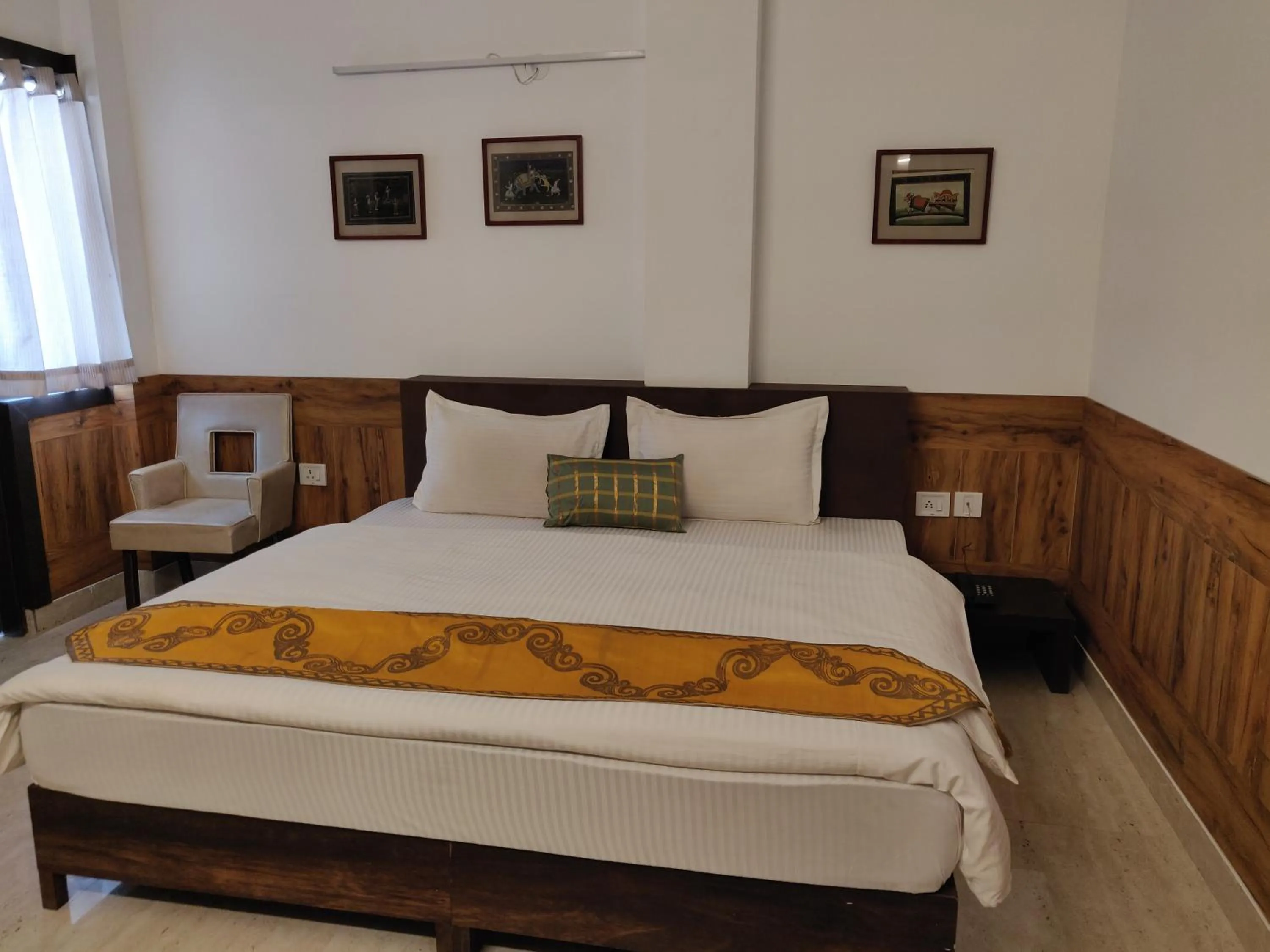 Bedroom, Bed in Aakritii Hotels