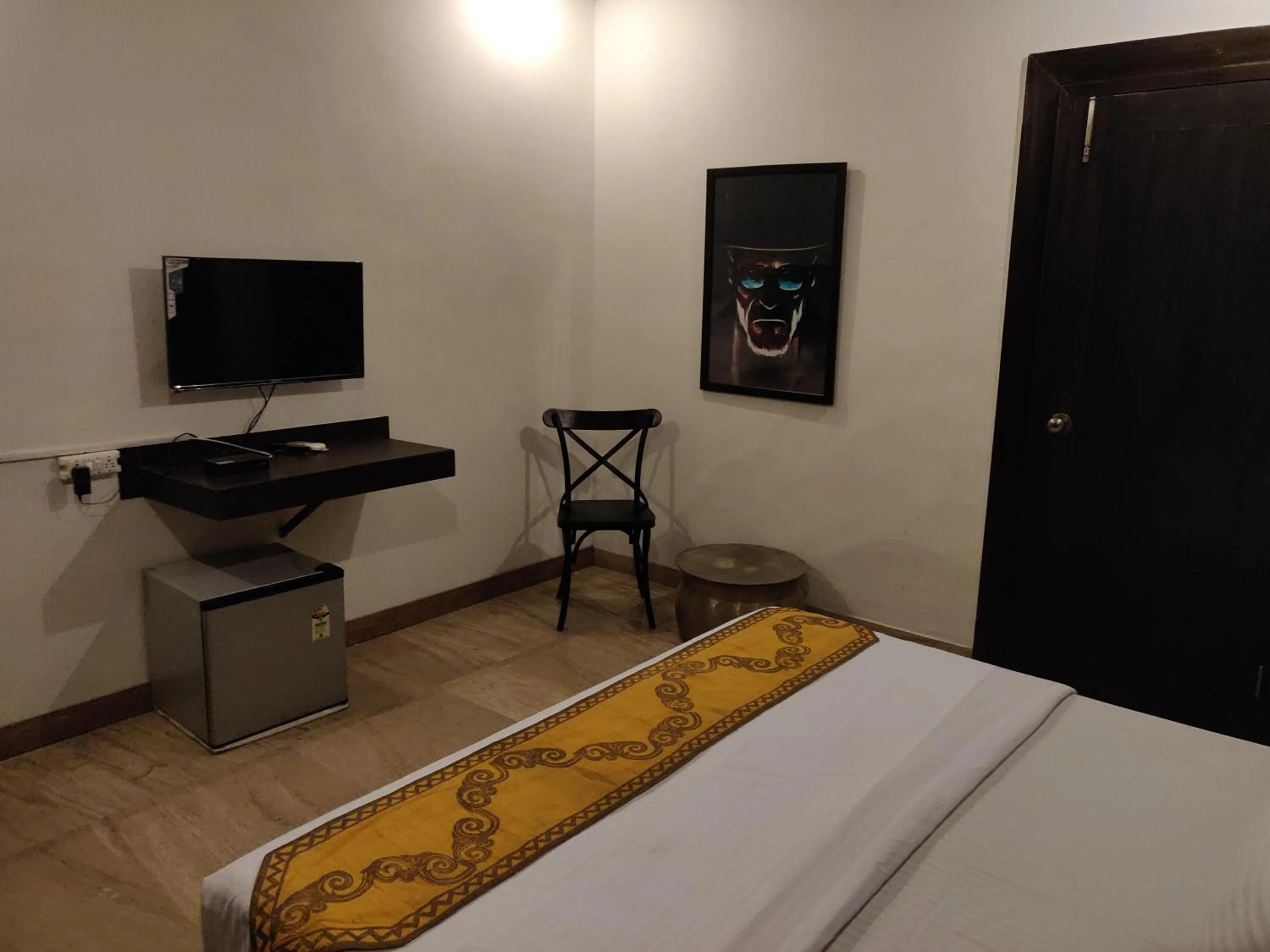 Photo of the whole room, Bed in Aakritii Hotels